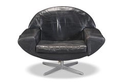 Johannes Andersen “Capri” Swivel Lounge Chair in Black Leather