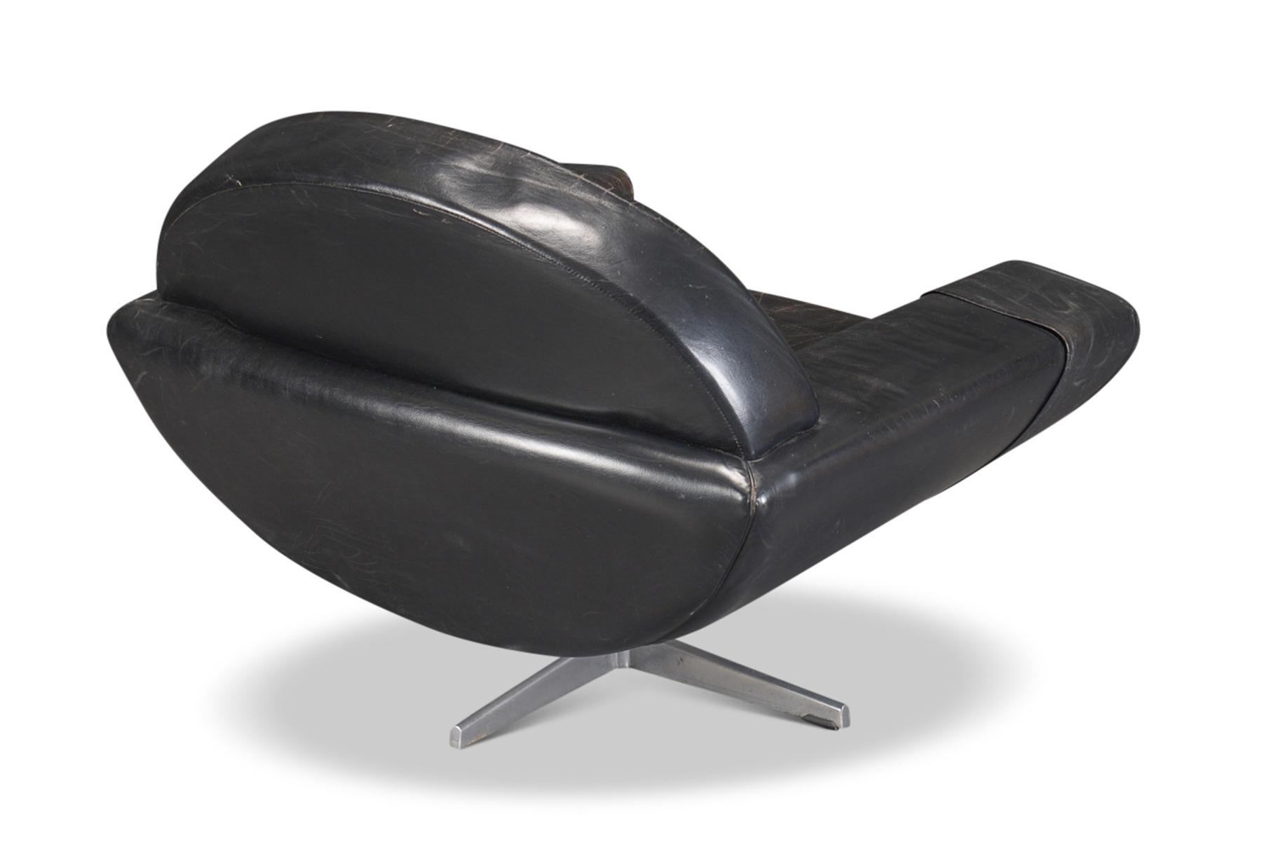 Danish Johannes Andersen “Capri” Swivel Lounge Chair in Black Leather For Sale