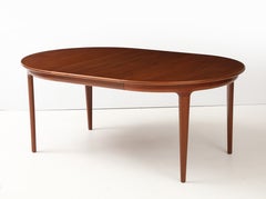 Johannes Andersen Danish Teak Dining Table With Two Leaves