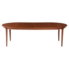 Johannes Andersen Danish Teak Dining Table With Two Leaves