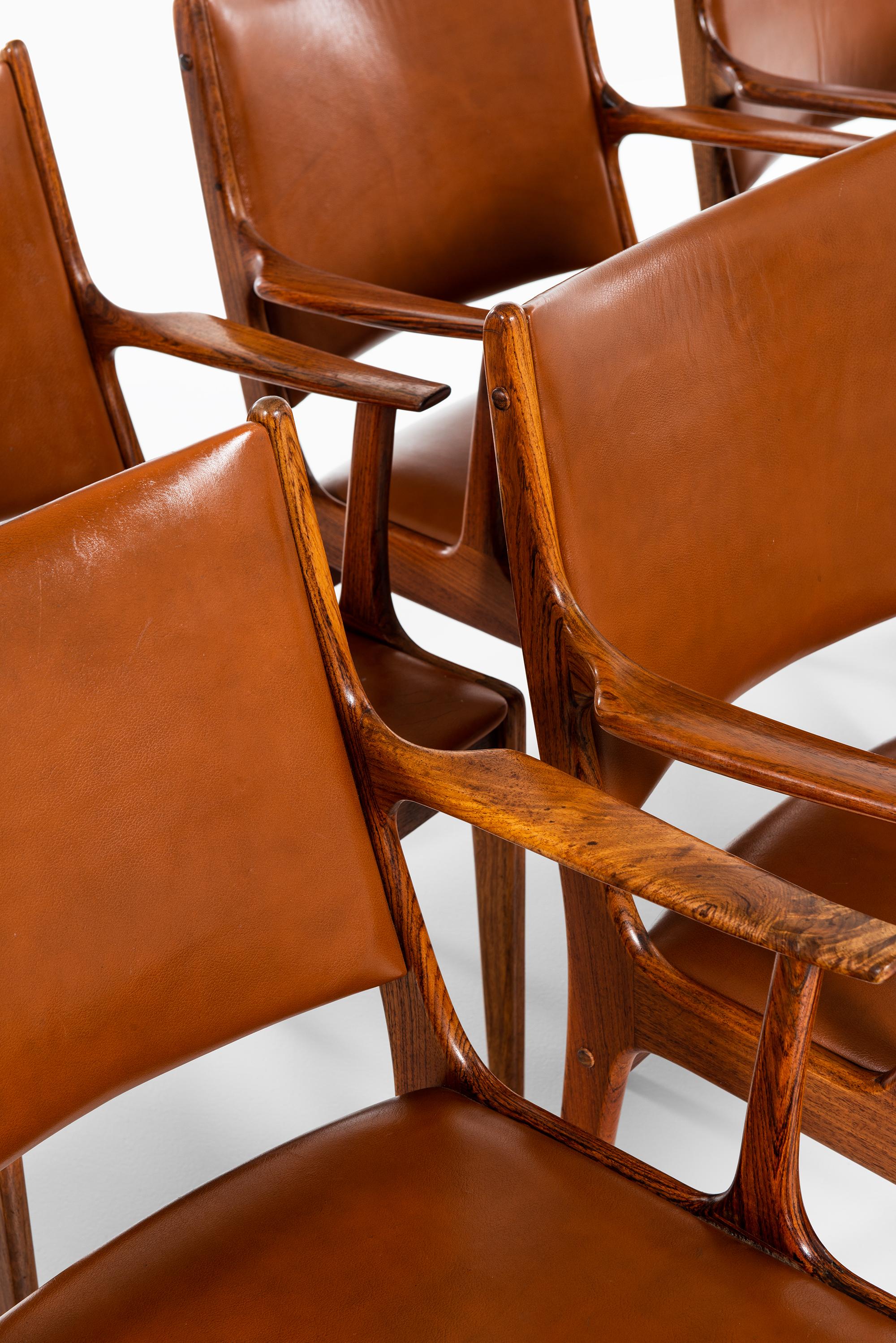 Scandinavian Modern Johannes Andersen Dining Chairs / Armchairs by Uldum Møbelfabrik in Denmark