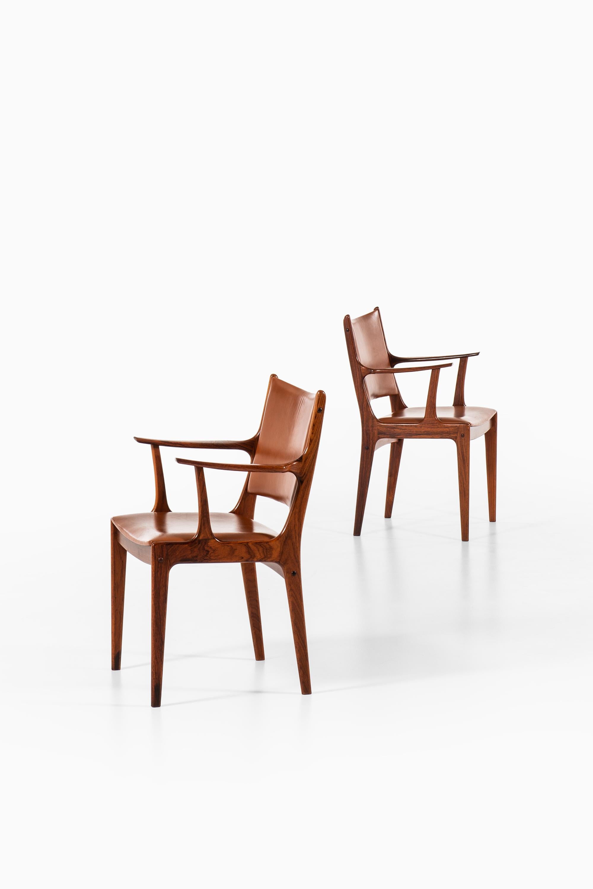 Mid-20th Century Johannes Andersen Dining Chairs / Armchairs by Uldum Møbelfabrik in Denmark