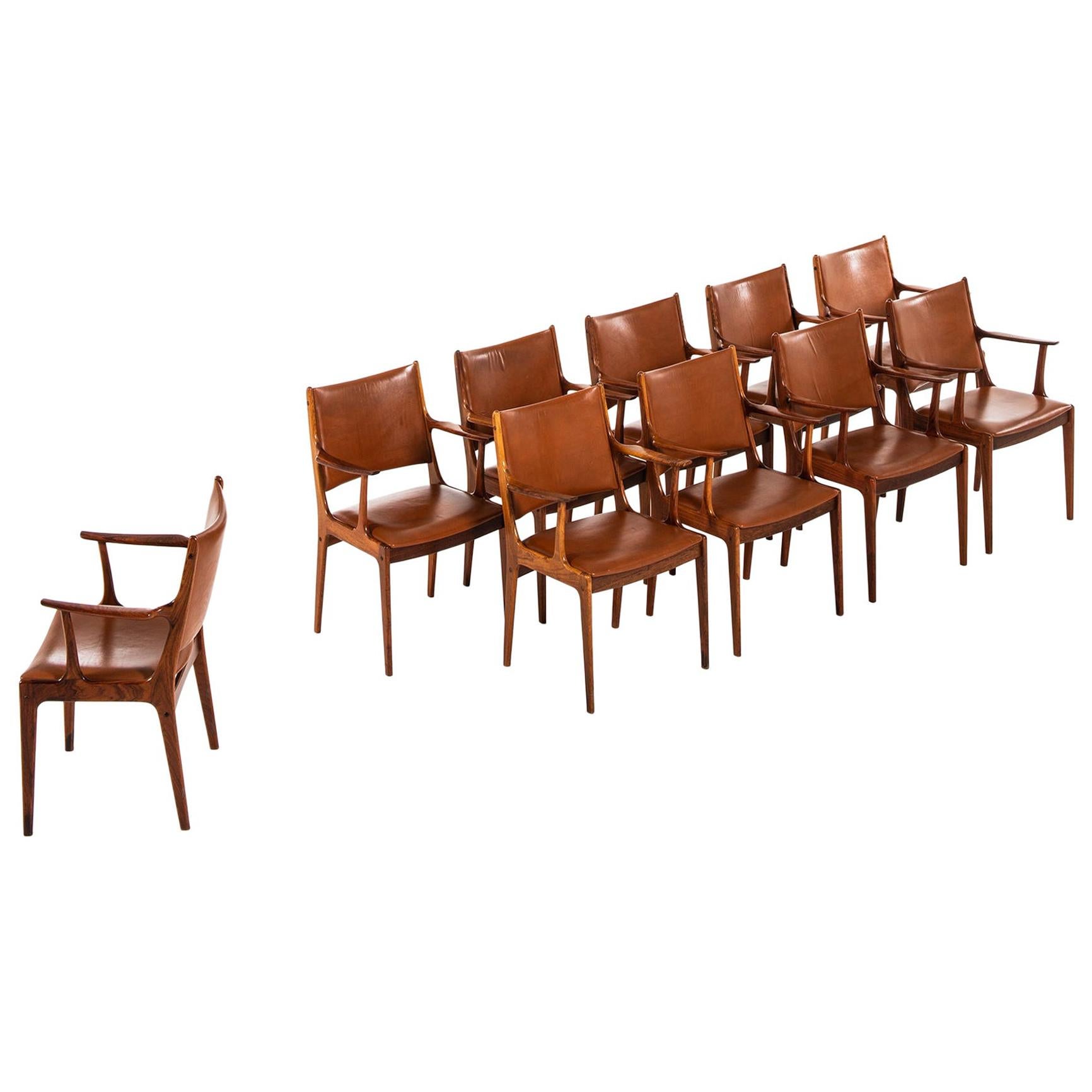 Johannes Andersen Dining Chairs / Armchairs by Uldum Møbelfabrik in Denmark