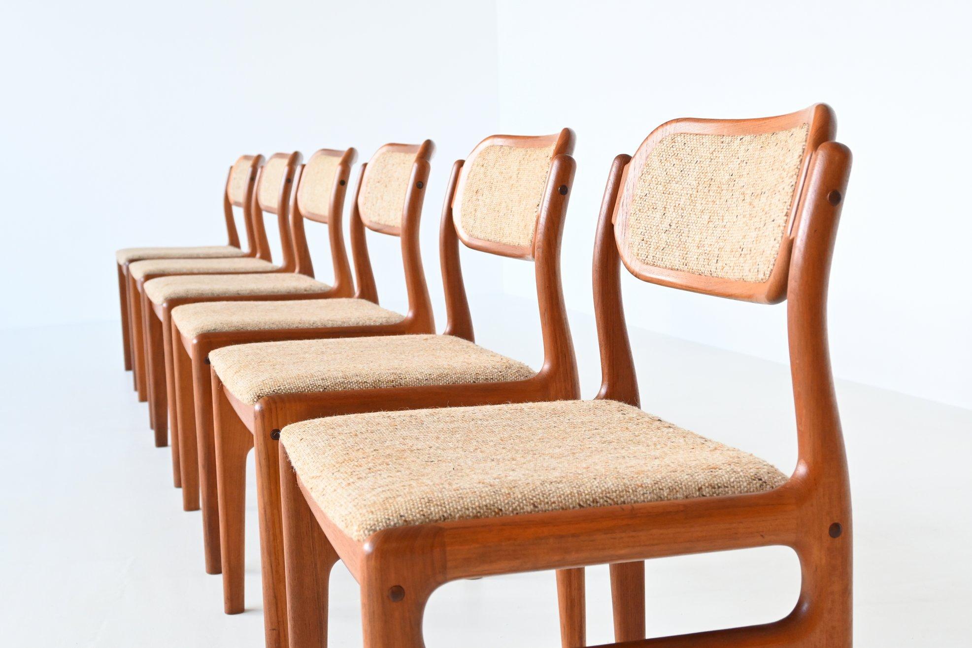Very nice set of six dining chairs designed by Johannes Andersen and manufactured by Uldum Møbelfabrik, Denmark 1960. They are made of solid teak wood and the seats are upholstered with beige brown fabric. These beautiful shaped chairs are in very