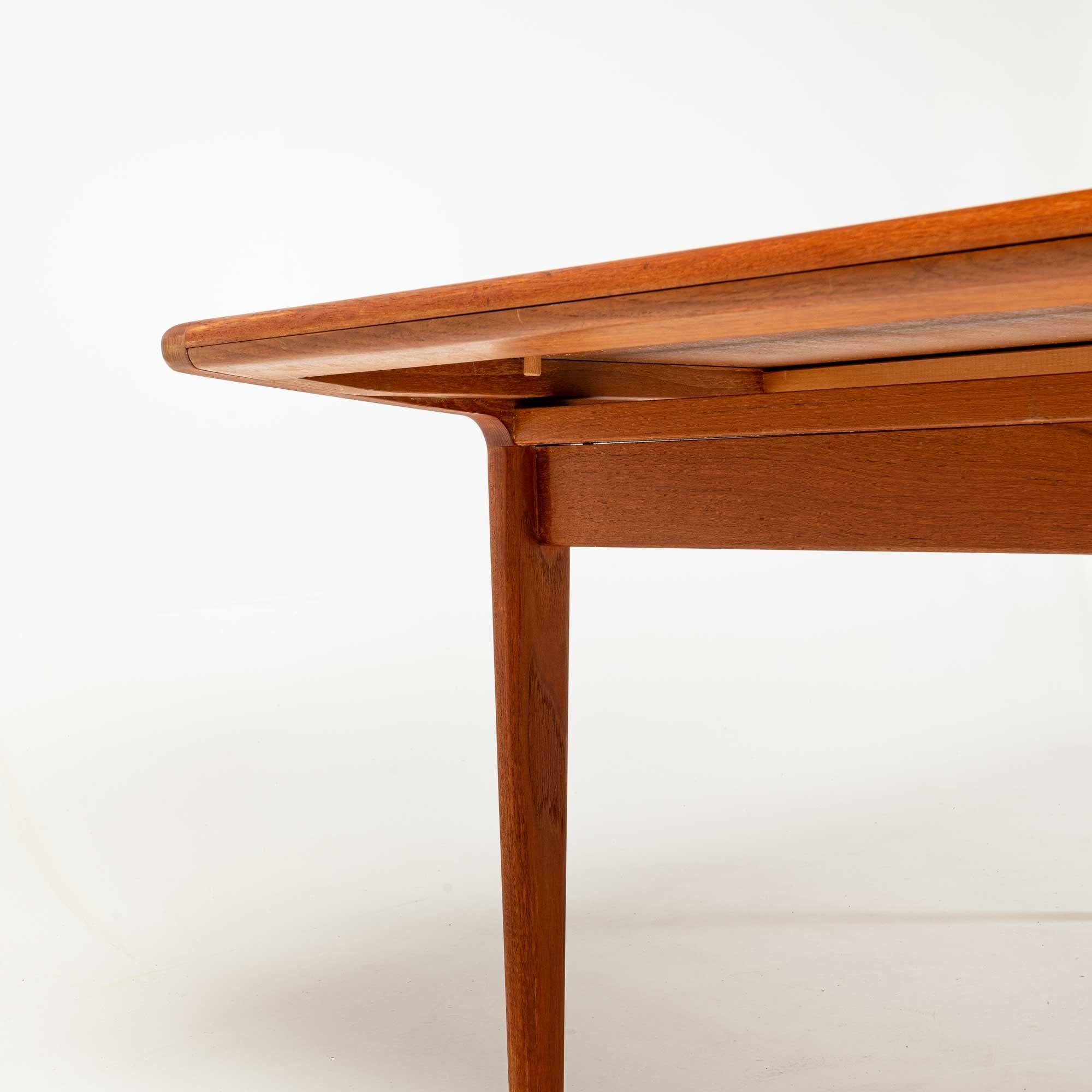 Danish Johannes Andersen Extendable Dining Table in Teak For Sale