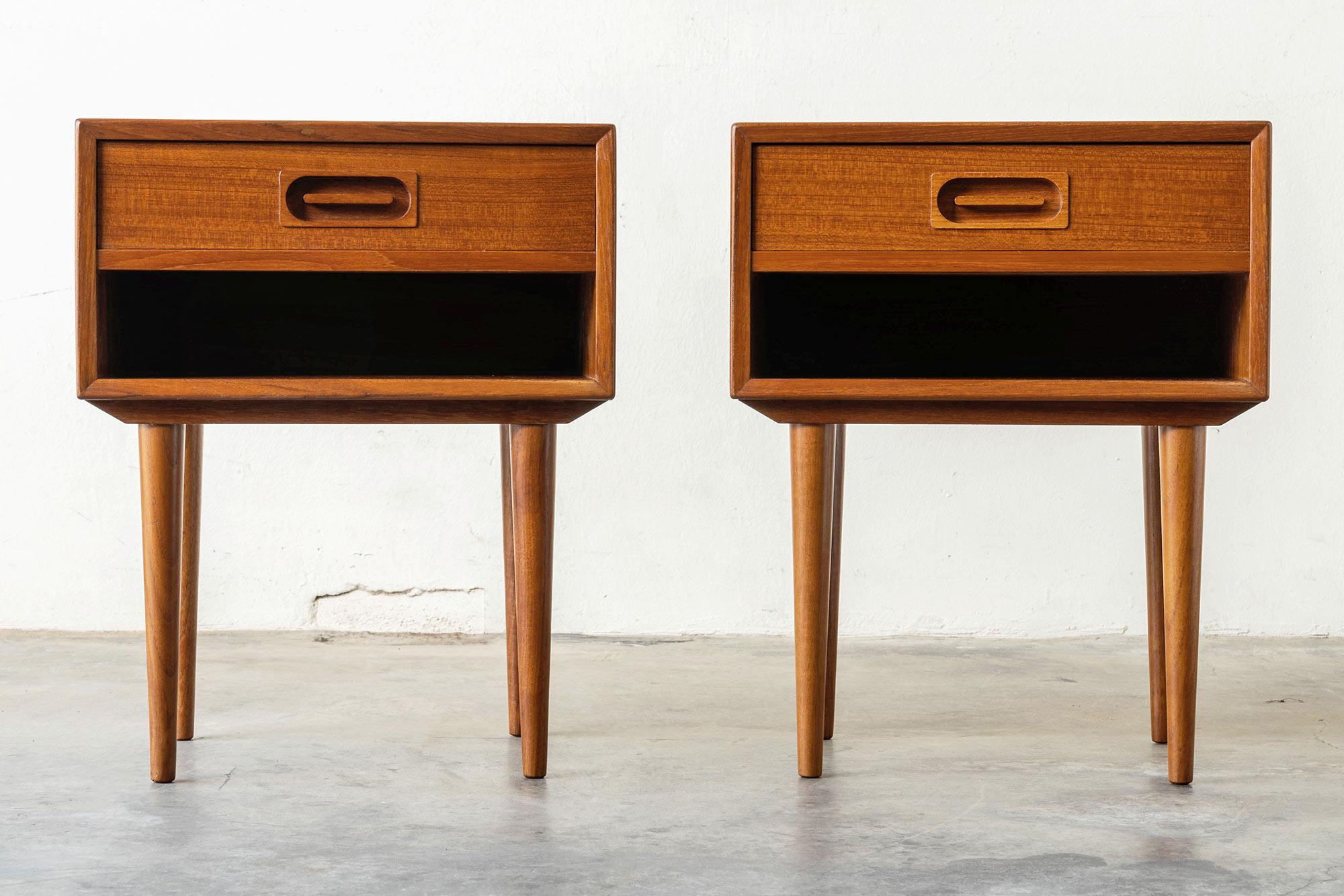 Looking for a sleek and stylish addition to your bedroom decor? Look no further than this pair of Johannes Andersen for Dyrlund teak nightstands. Designed by the renowned Danish designer Johannes Andersen, these nightstands combine form and function