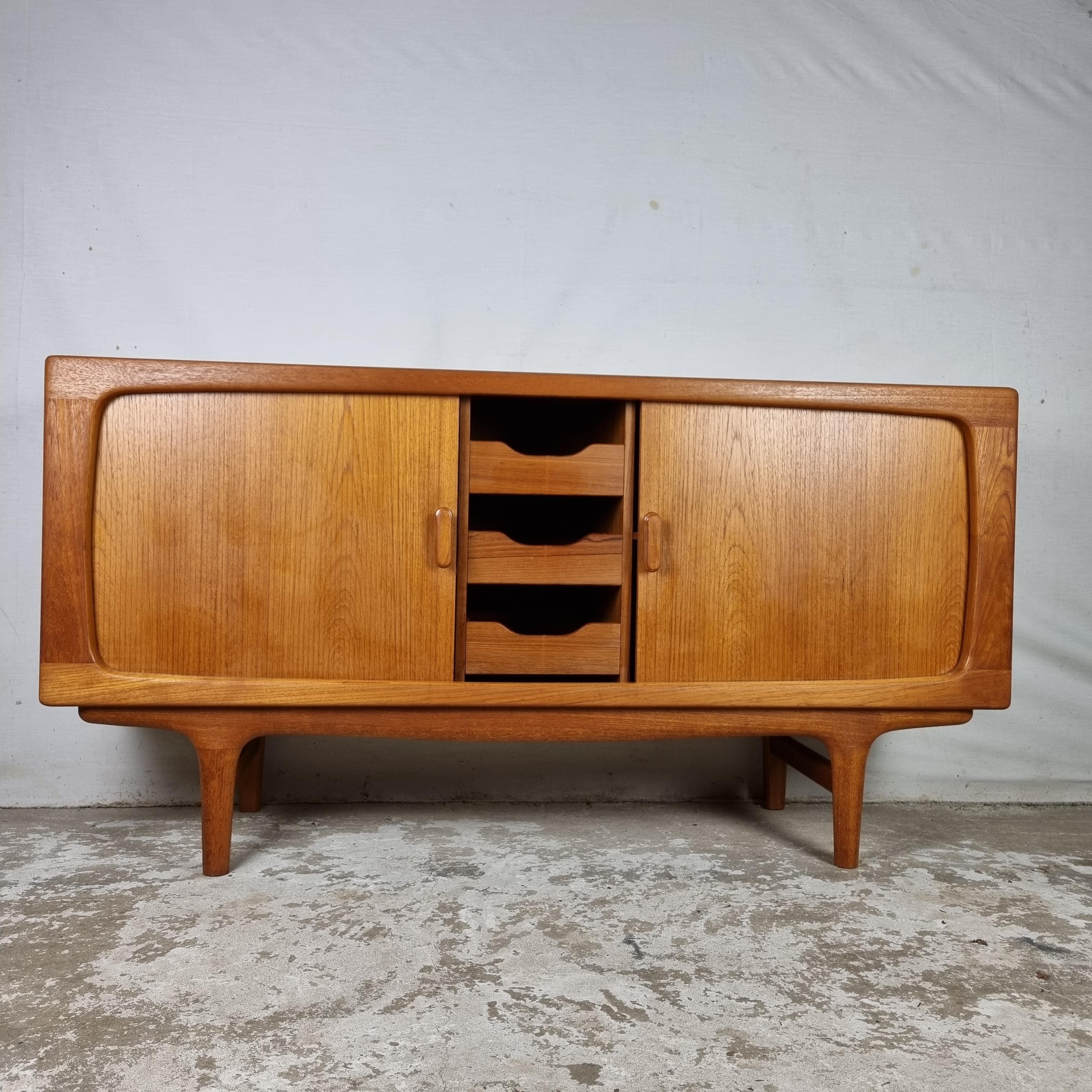 Beautiful Mid Century Danish sideboard / dresser from the 1960s. Designed by Johannes Andersen for the high-end quality brand CFC Silkeborg from Denmark 🇩🇰. 

Still in very good condition! Made from the most beautiful teak wood, equipped with