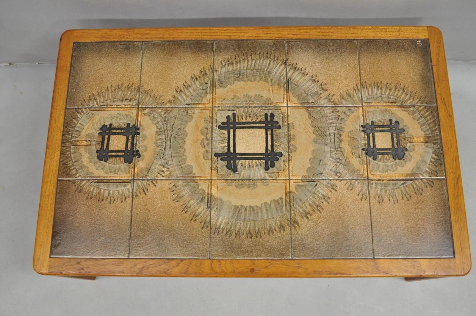 Johannes Andersen Vintage Mid Century Danish Modern Moasic Ceramic Tile Teak Wood Coffee Table with Artist Initials. Circa Mid 20th Century. Measurements: 16.5