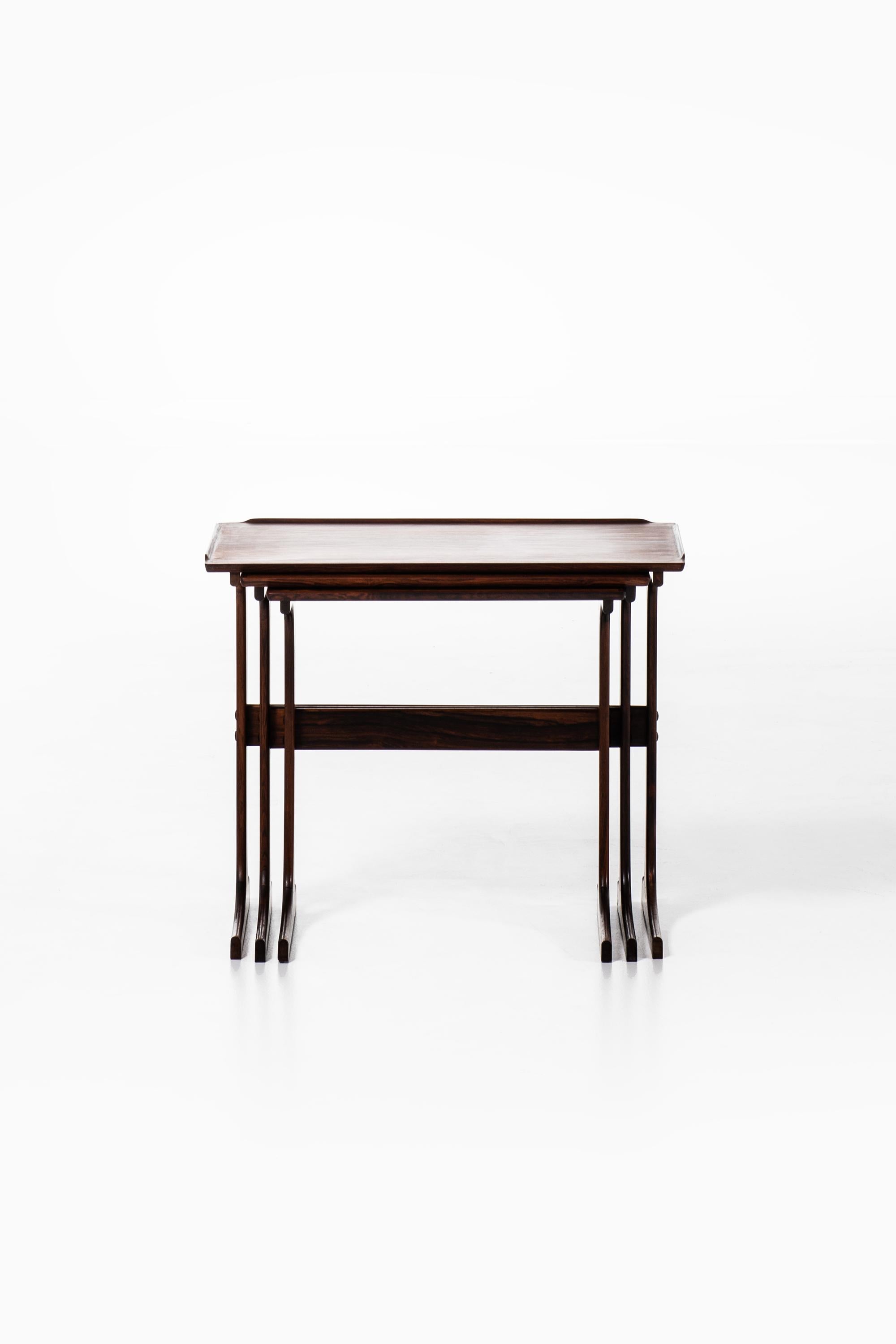 Rare nesting tables designed by Johannes Andersen. Produced by CFC Silkeborg in Denmark.