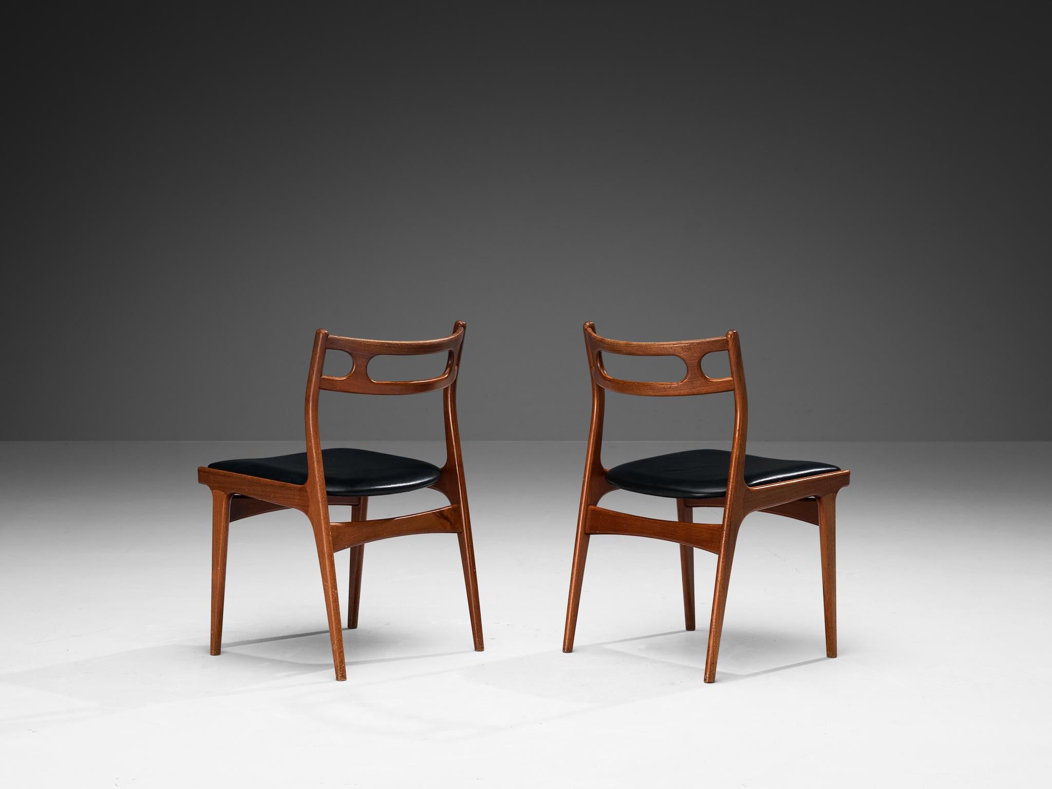 Mid-20th Century Johannes Andersen Set of Four Dining Chairs in Teak and Black Upholstery  For Sale