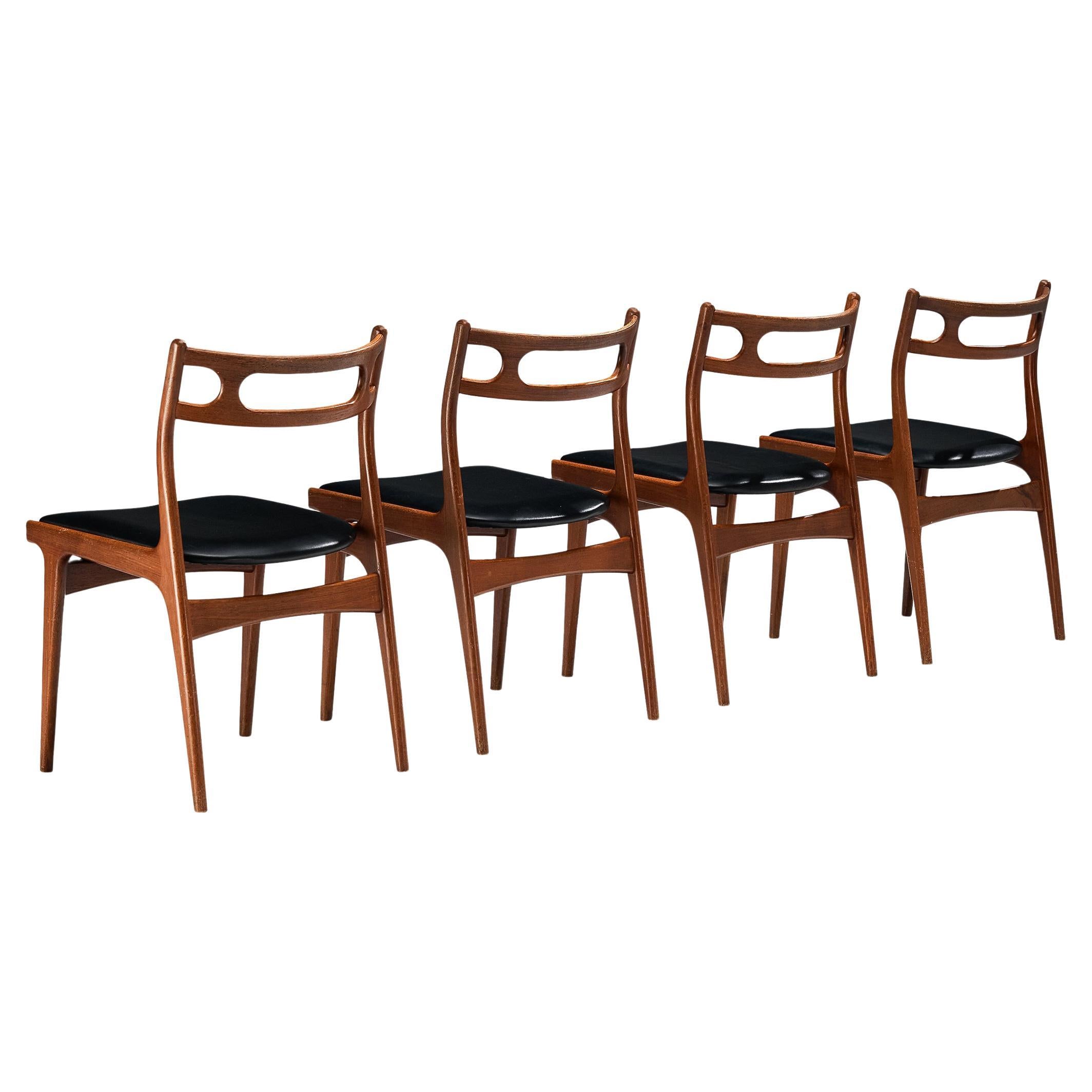 Johannes Andersen Set of Four Dining Chairs in Teak and Black Upholstery  For Sale