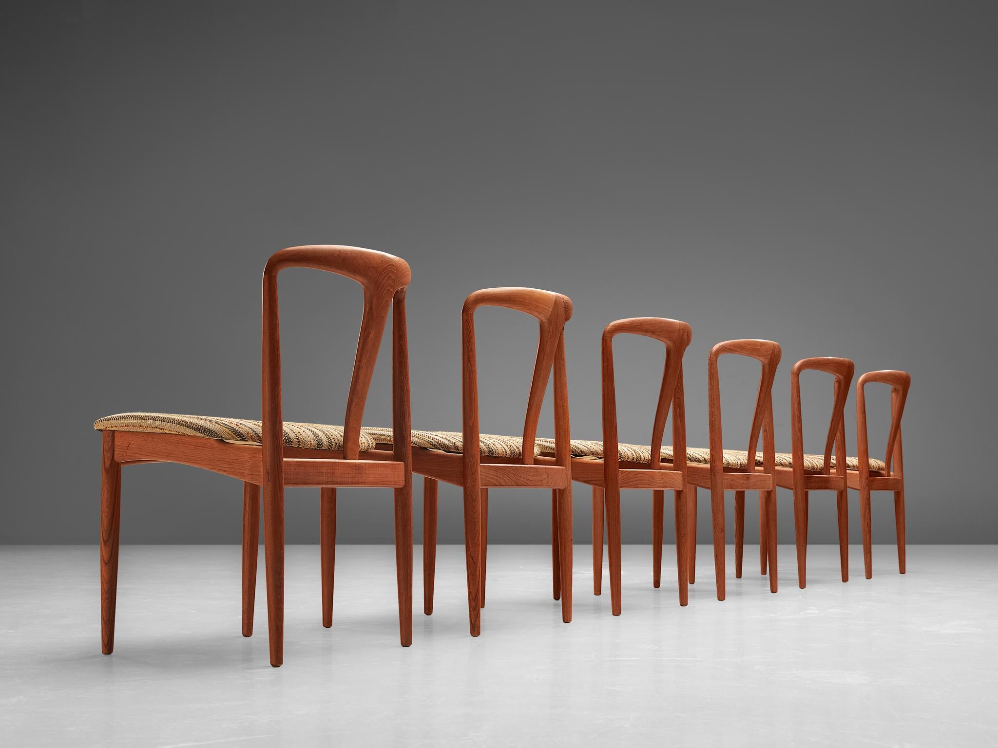 Johannes Andersen for Uldum Møbelfabrik, 'Juliane' set of six dining chairs, teak and textured and striped fabric upholstery, Denmark, 1960s

This set of six dining chairs is designed by the Danish Johannes Andersen and produced by Uldum