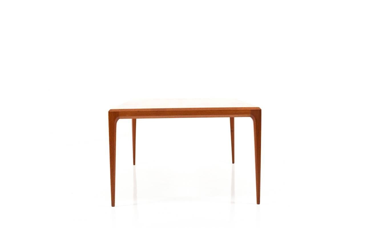 Early Danish sofa table in teak. Designed by Johannes Andersen for CFC Silkeborg in 1960s. High Danish quality.