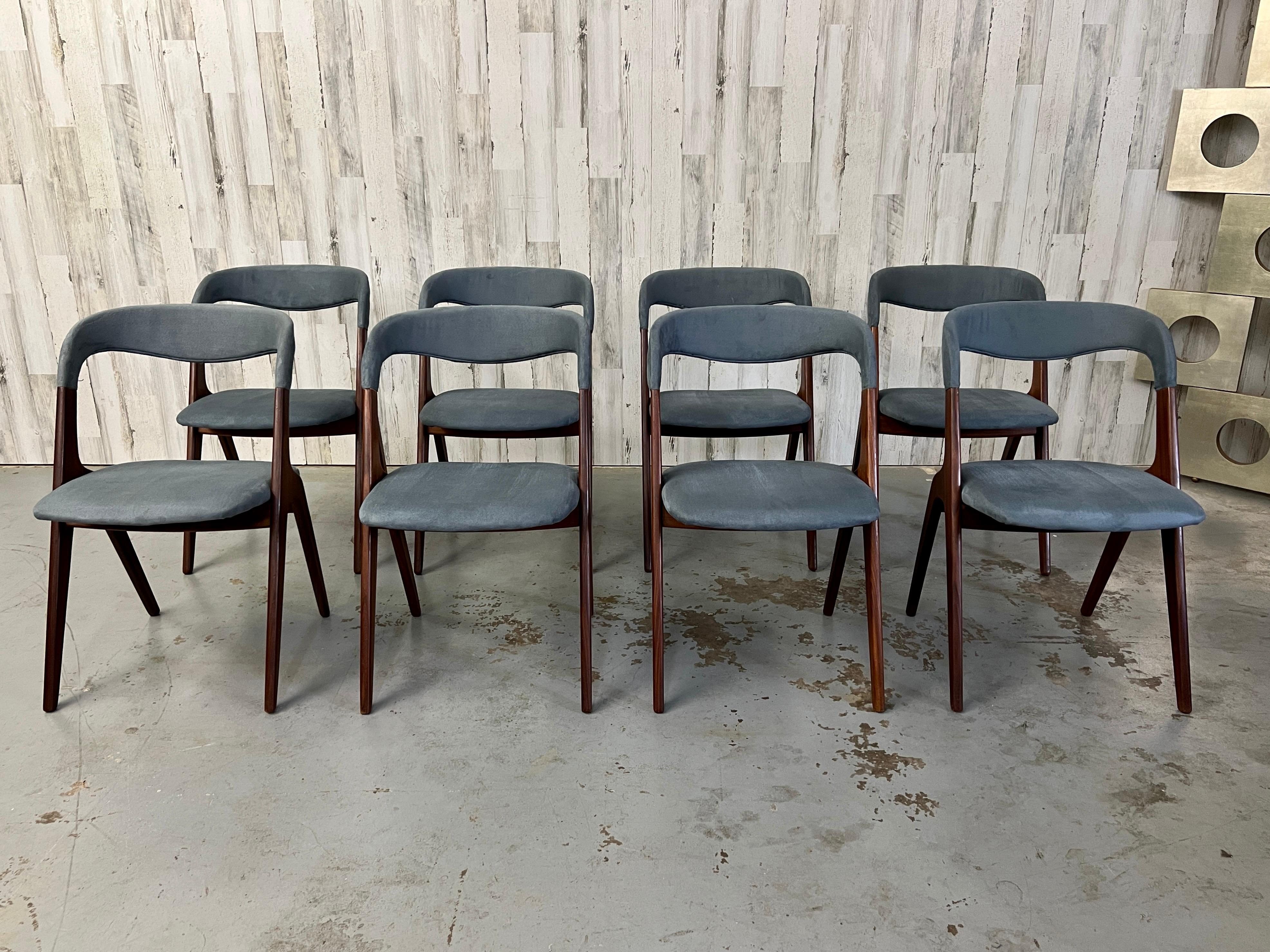 Set of 8 teak dining chairs designed by Johannes Andersen for Vamo Sonderborg. Model ‘Sonja’ circa 1960.