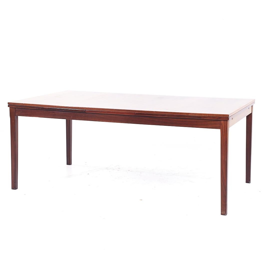 Mesa de comedor con hoja oculta de palisandro danés de mediados de siglo, estilo Johannes Andersen Moderno de mediados de siglo en venta