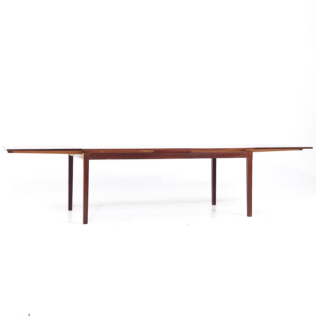 Mesa de comedor con hoja oculta de palisandro danés de mediados de siglo, estilo Johannes Andersen Palo de rosa en venta