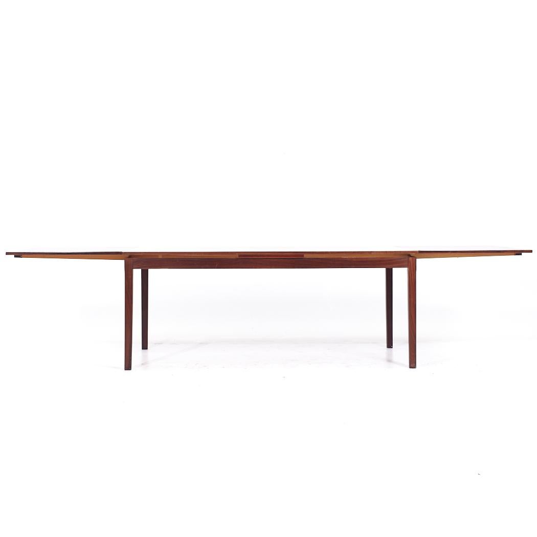 Mesa de comedor con hoja oculta de palisandro danés de mediados de siglo, estilo Johannes Andersen en venta 1