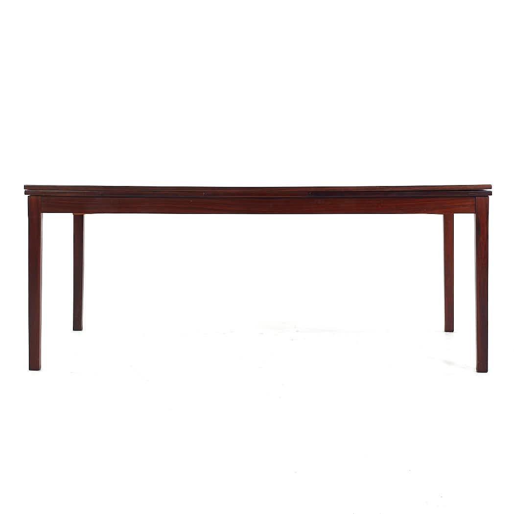 Mid-Century Modern Johannes Andersen Style Mid Century Rosewood Hidden Leaf Dining Table For Sale