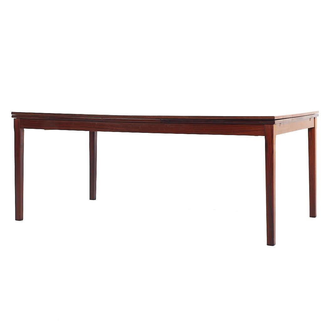 American Johannes Andersen Style Mid Century Rosewood Hidden Leaf Dining Table For Sale