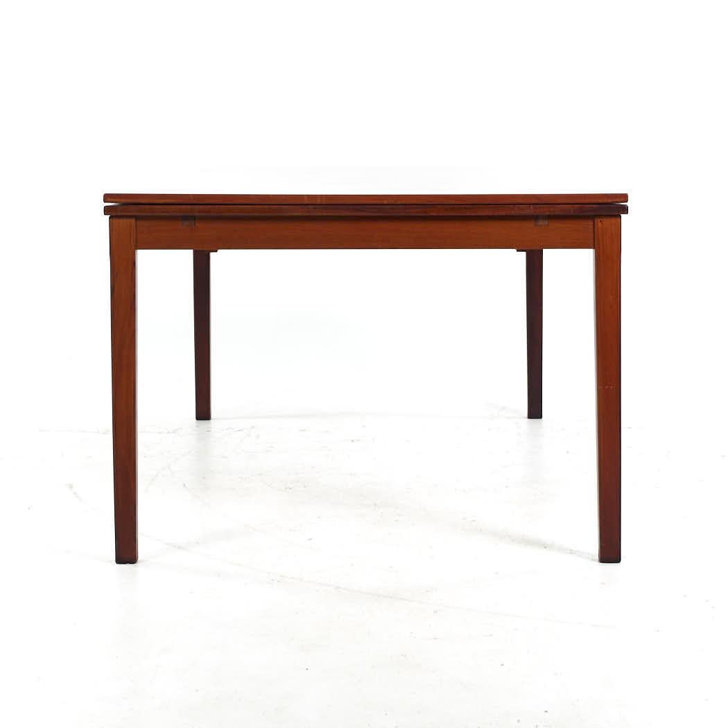 Johannes Andersen Style Mid Century Rosewood Hidden Leaf Dining Table For Sale 1