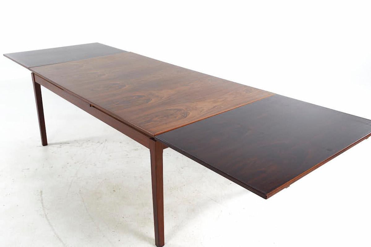 Johannes Andersen Style Mid Century Rosewood Hidden Leaf Dining Table For Sale 2