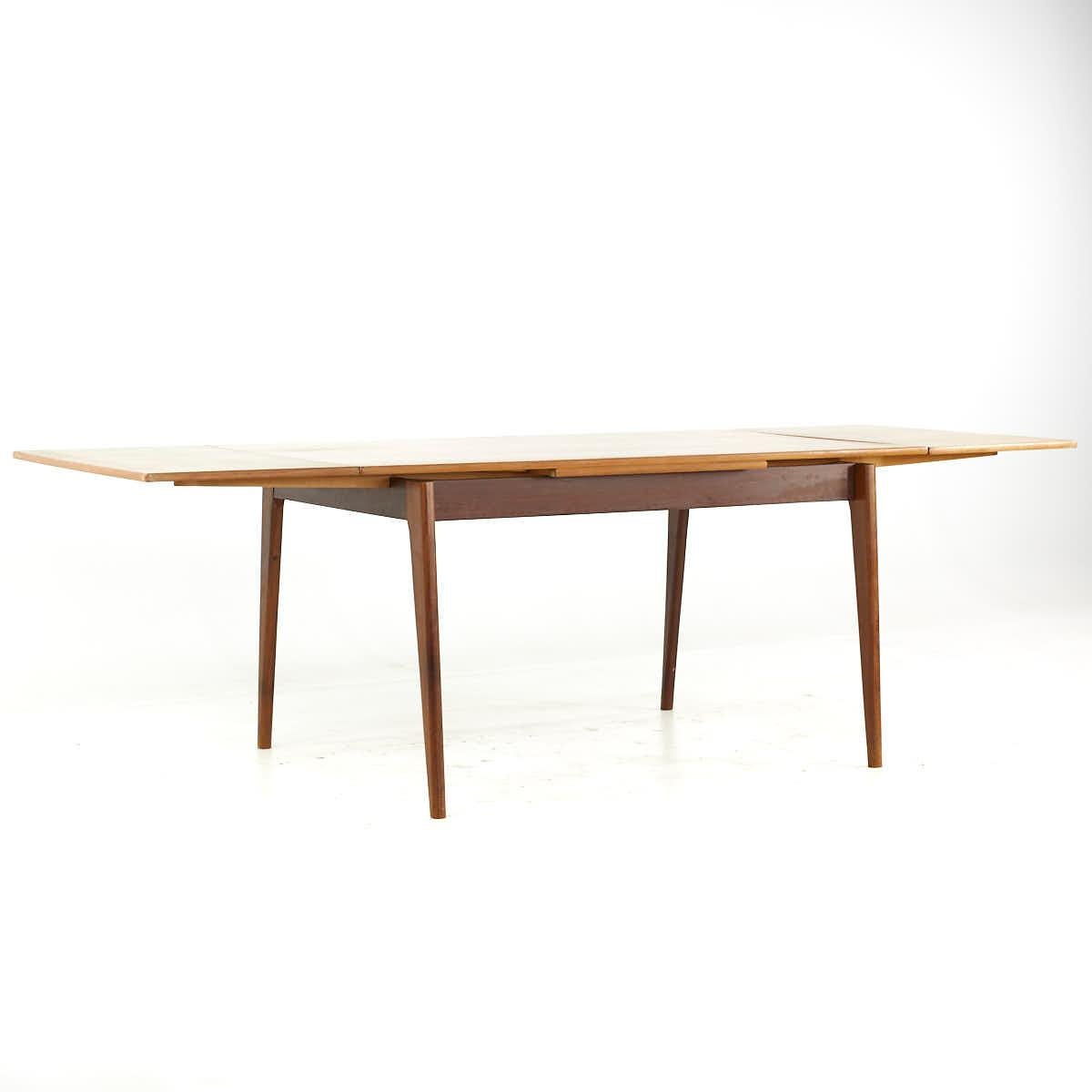 Late 20th Century Johannes Andersen Style Mid Century Teak Hidden Leaf Dining Table For Sale