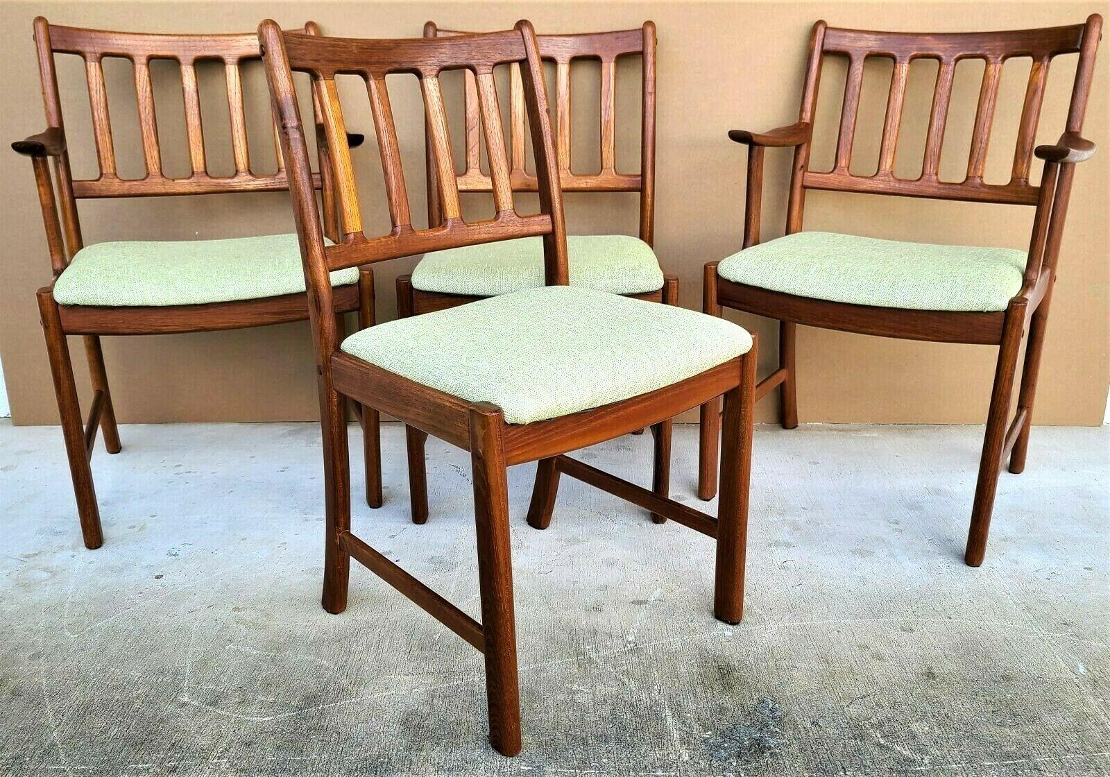 Offering One Of Our Recent Palm Beach Estate Fine Furniture Acquisitions Of A
Set of 4 Johannes Andersen Teak Dining Chairs for Uldum Møbelfabrik 
Set includes 2 arm and 2 side chairs

Approximate Measurements in Inches
Armchairs:
34