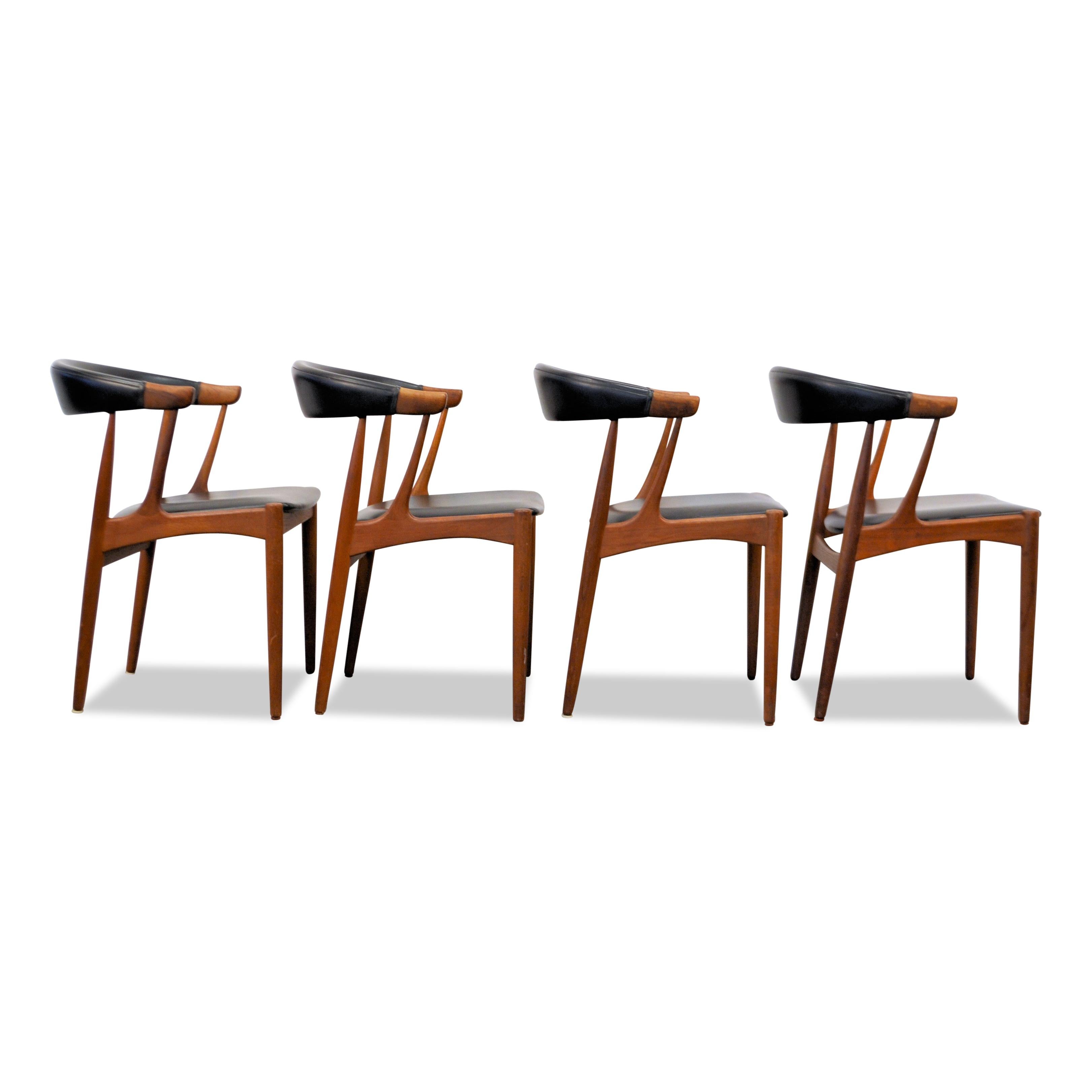 Set of four vintage dining chairs designed in the 1960s by worldwide known and appreciated furniture designer Johannes Andersen. His designs are considered high end Danish modern design. These chairs feature Andersen’s characteristic organic curved