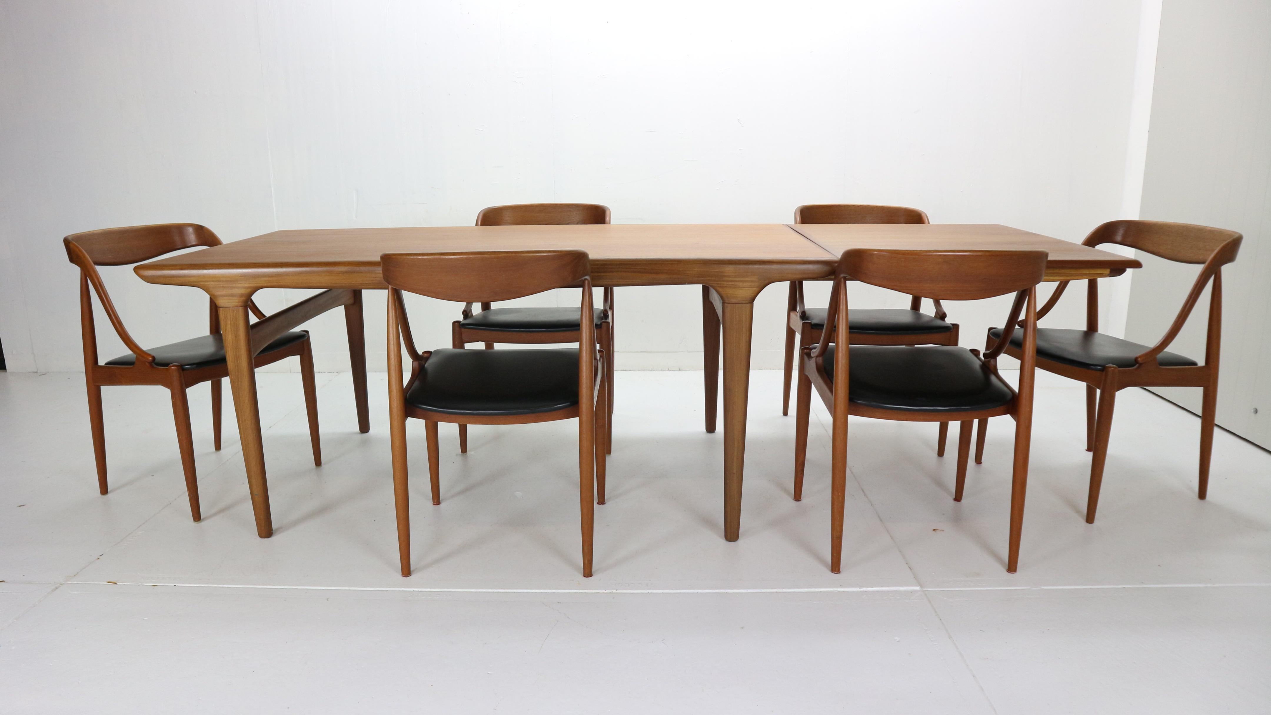 Beautiful dinning room set designed by Johannes Andersen for Uldum Møbelfabrik, 1960s Denmark.
This set features extendable dinning table and set off 6 dinning chairs.

Extendable dinning table is made of solid teak wood. 
Measurements: H- 72cm