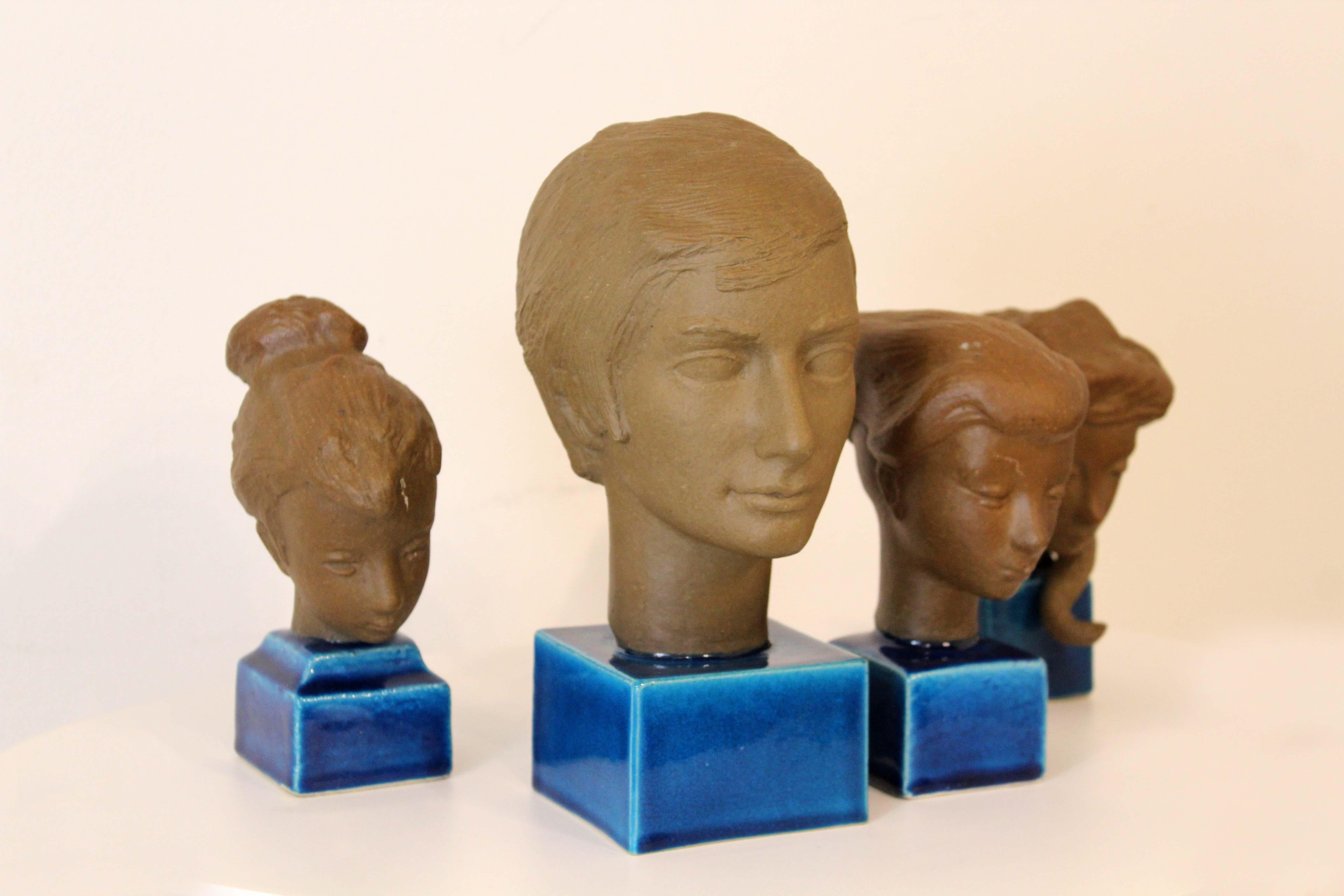 An interesting set of 4 modern inspired hand-crafted ceramic busts by Johannes Hedegaard for Royal Copenhagen Denmark. Each sculpture is marked on the bottom with Hedegaard’s signature with a inventory number. Dimensions: 8.5 x 4w x 5.75w / 5.5h x