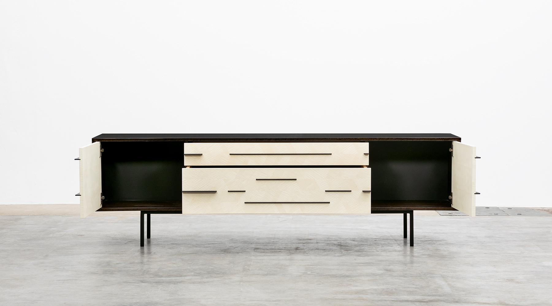 Sideboard by contemporary German artist Johannes Hock. The doors and drawer of this unique piece are made of tiger maple, the corpus of smoked eucalyptus, the handles are ebony and it comes on black metal legs. Manufactured by Atelier Johannes Hock.