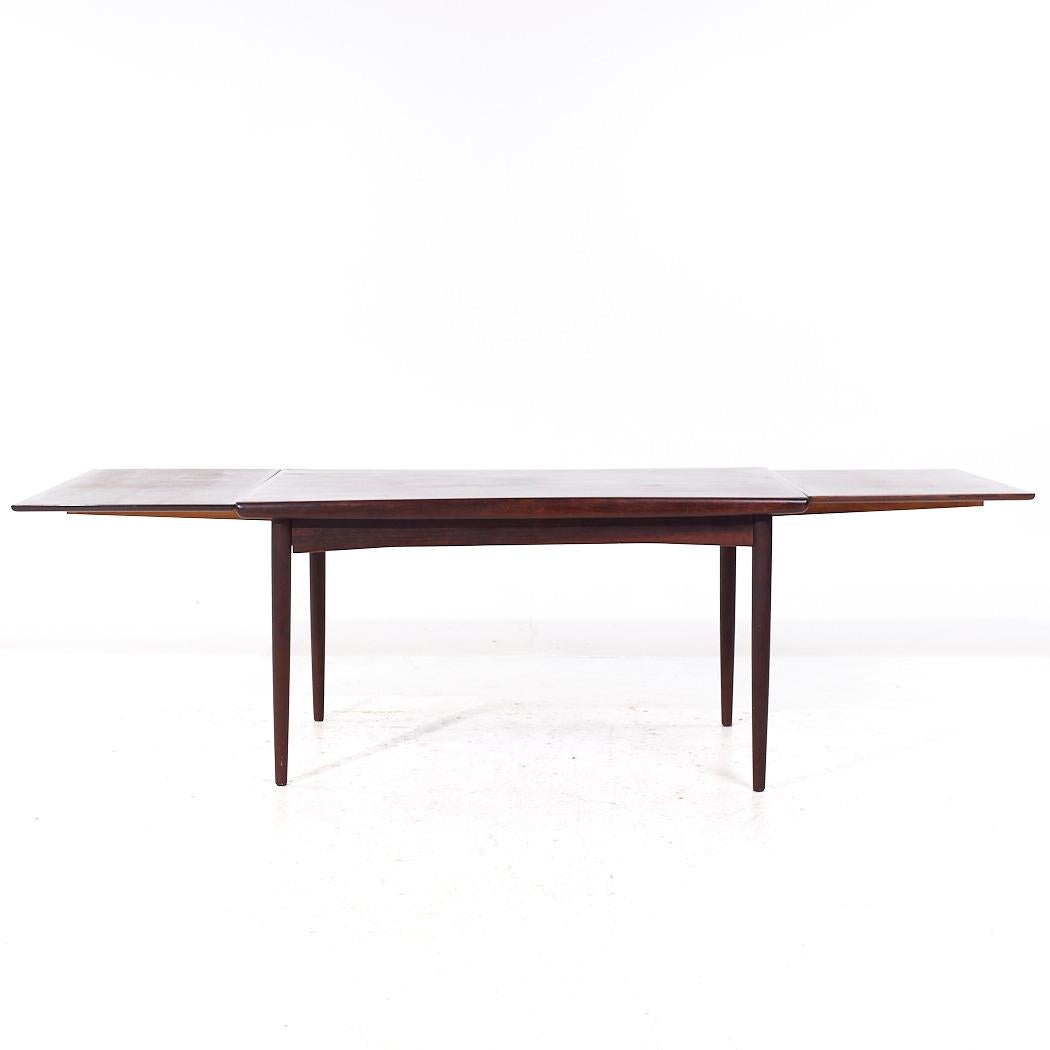 Fin du 20e siècle Johannes Nørgaards Møbelfabrik MCM Table à feuilles cachées en bois de rose danois en vente