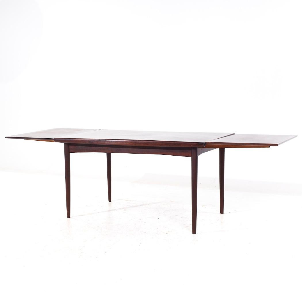 Bois de rose Johannes Nørgaards Møbelfabrik MCM Table à feuilles cachées en bois de rose danois en vente