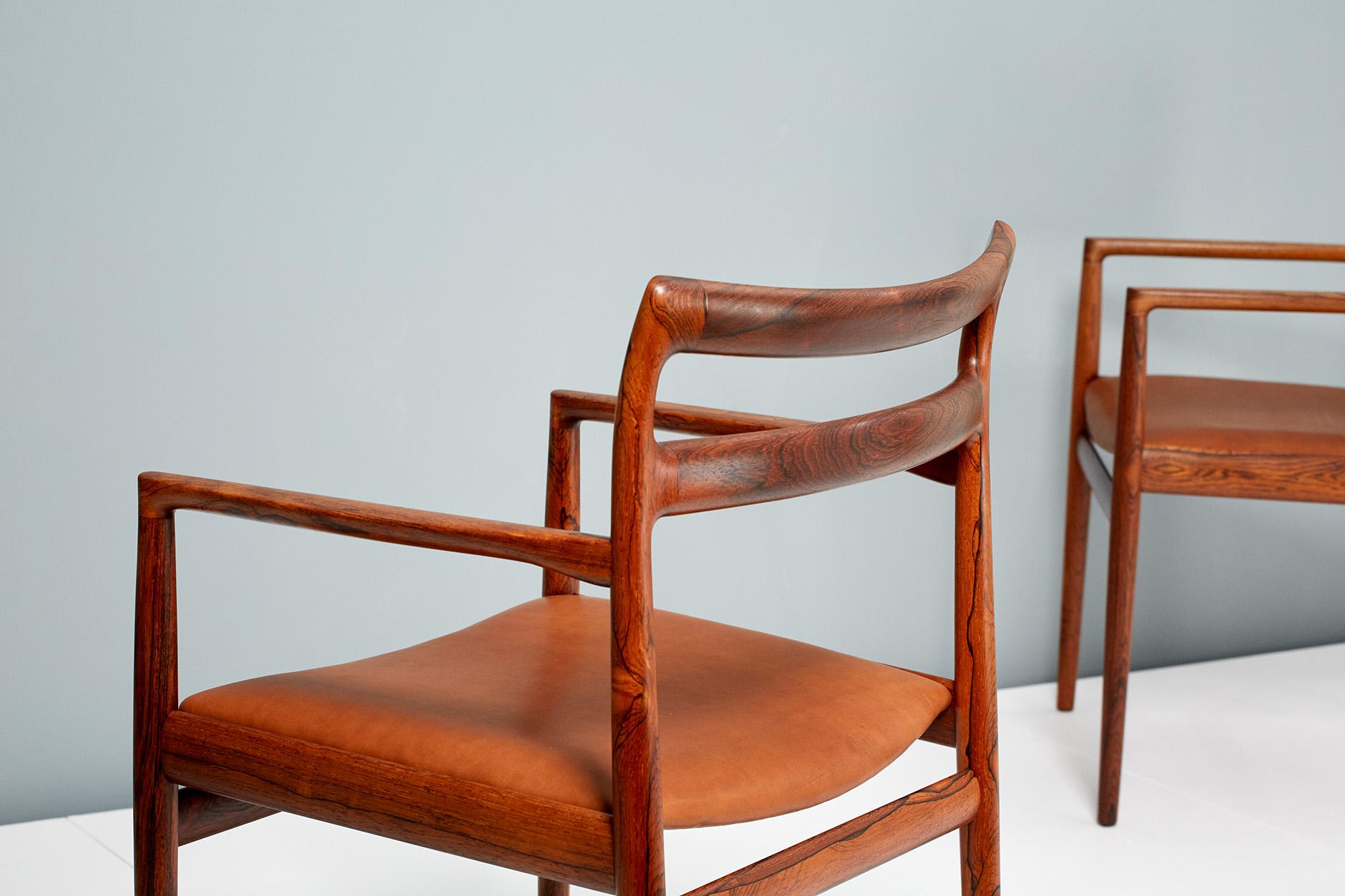 Johannes Nørgaard

Armchairs, circa 1960

Pair of armchairs attributed to Johannes Nørgaard and produced in stunning, exotic rosewood by Nørgaard Møbelfabrik, circa 1960 in Denmark. Seats upholstered in cognac brown aniline leather.