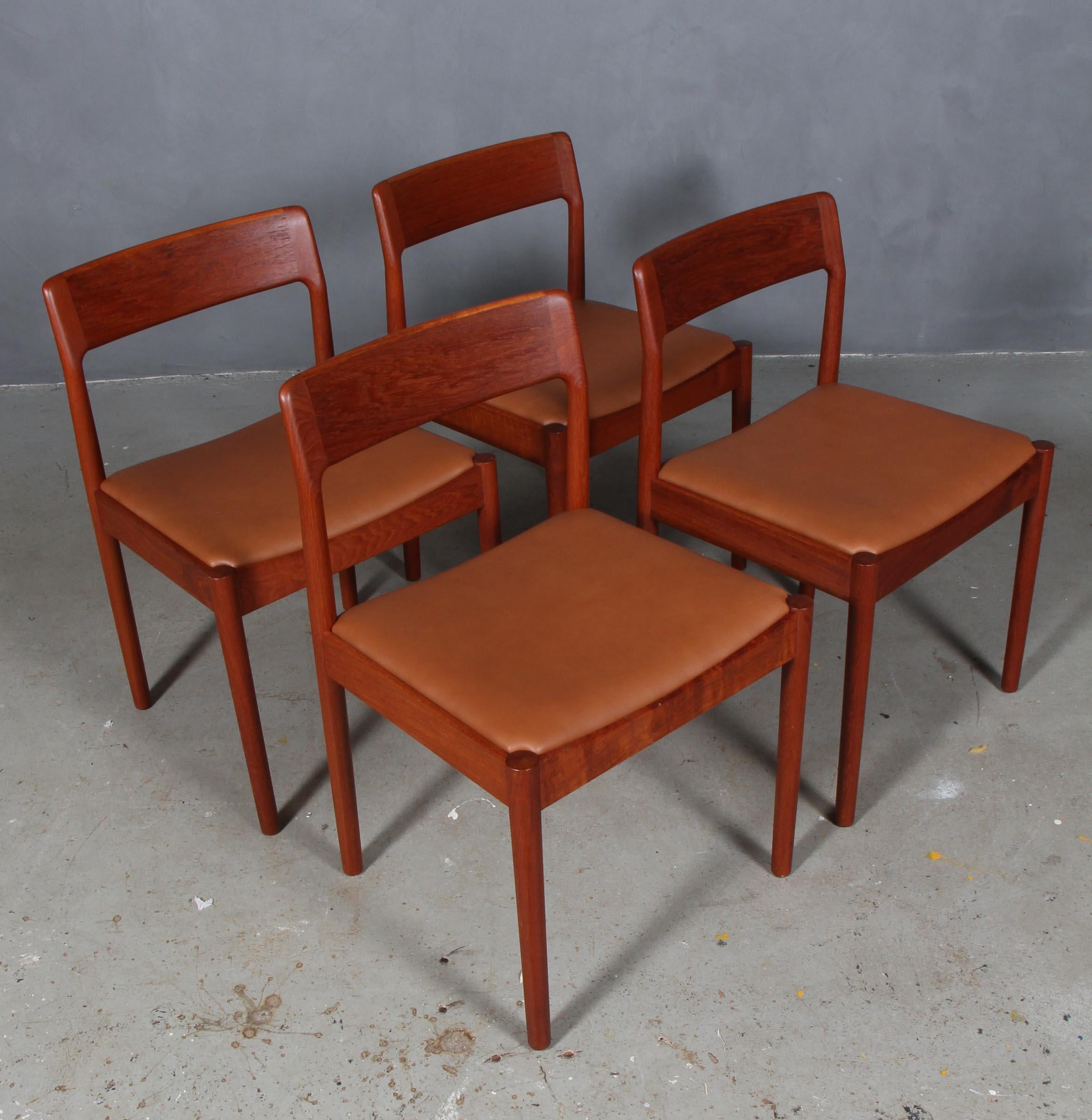 Johannes Nørgaard set of four chairs in teak

New upholstered with tan aniline leather.

Made by Nørgaards møbelfabrik 1960s.