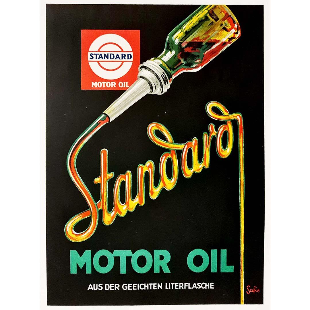 Standard Motor Oil advertisement showing a glass liter bottle flowing into the word "Standard". Poster designed by Johannes Safis in 1928.

Text reads Standard Motor Oil Aus Der Geeichten Literflasche (from the calibrated liter bottle)

Art Deco -