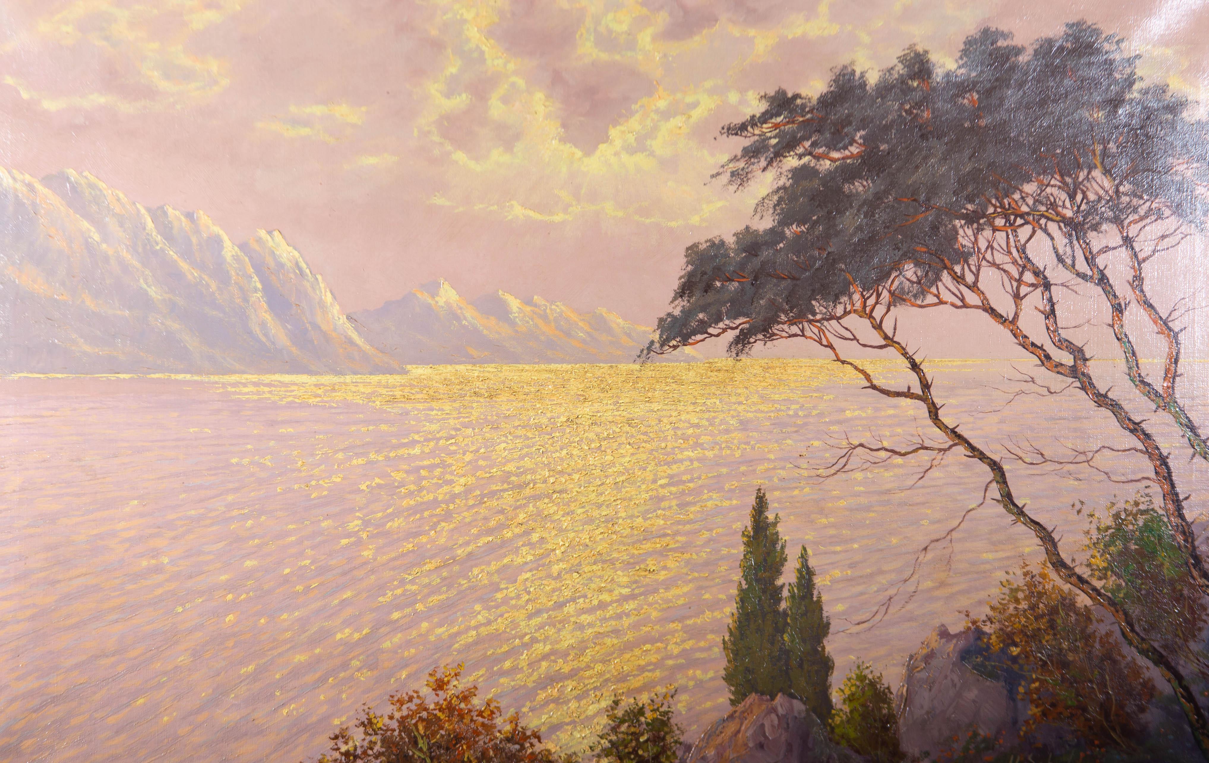 A striking oil landscape showing a Mediterranean coastline with cypress and pine trees on the rocky shore. A beautiful glittering ocean reflects the gold light of the setting sun, disappearing behind clouds and the distant mountains. The artist has