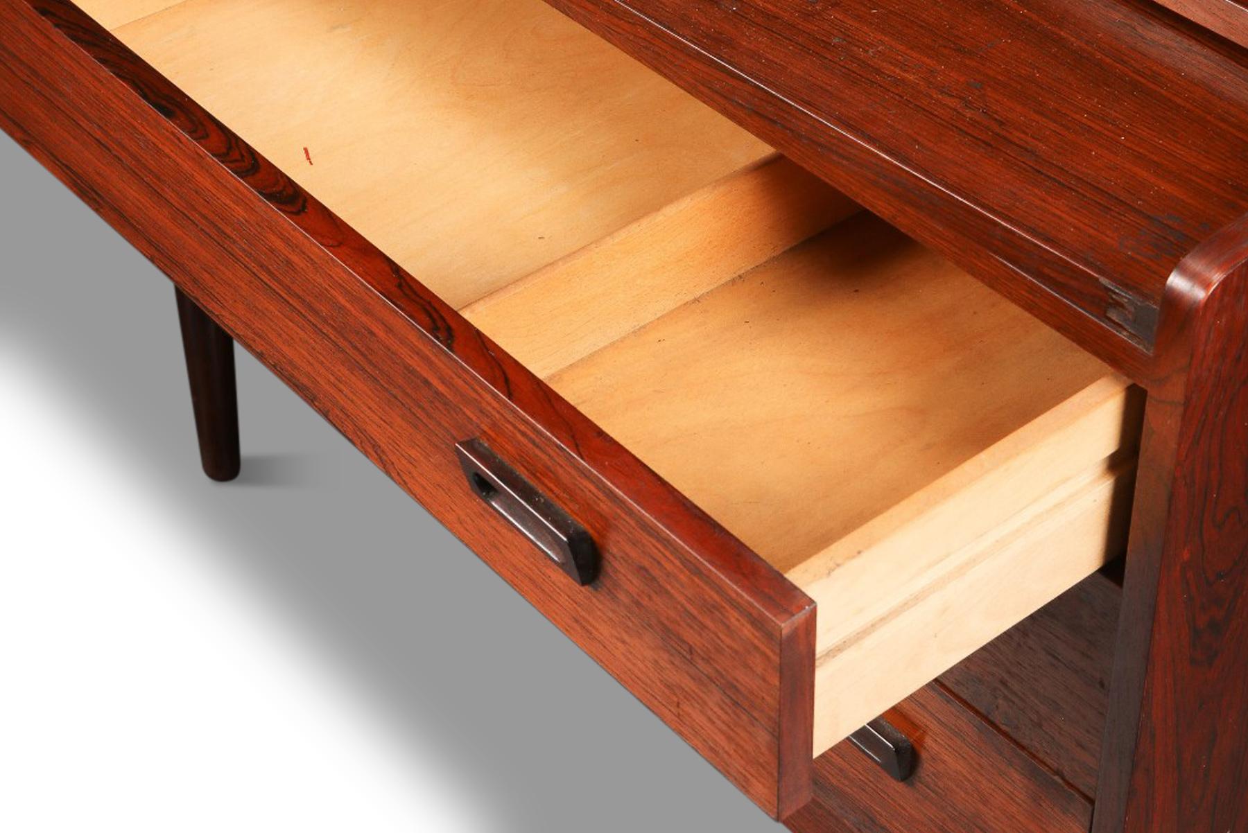 Origin: Denmark
Designer: Johannes Sorth
Manufacturer: Nexø
Era: 1960s
Materials: Rosewood
Measurements: 39.75