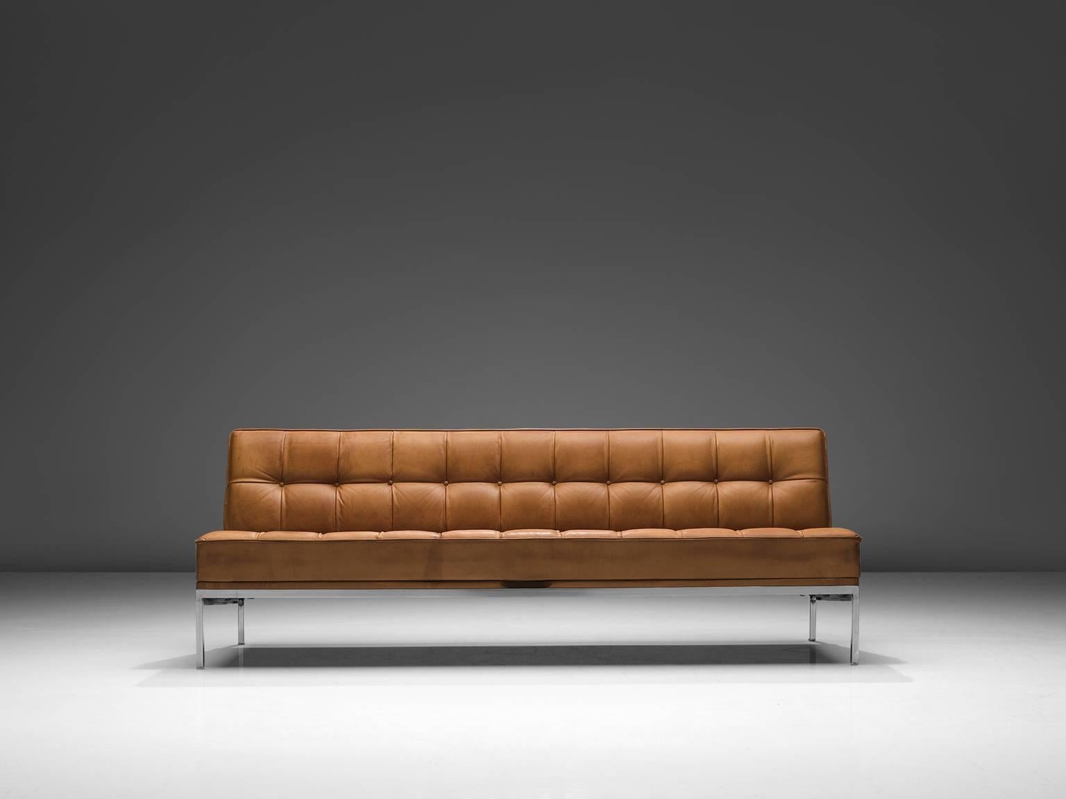 Johannes Spalt for Wittmann, 'Constanze' daybed or sofa, cognac leather, steel, Austria, 1960s. 

This Austrian daybed named 'Constanze' is typical for Mid-Century Modern design. The tufted leather seat and back is constructed with the slick and