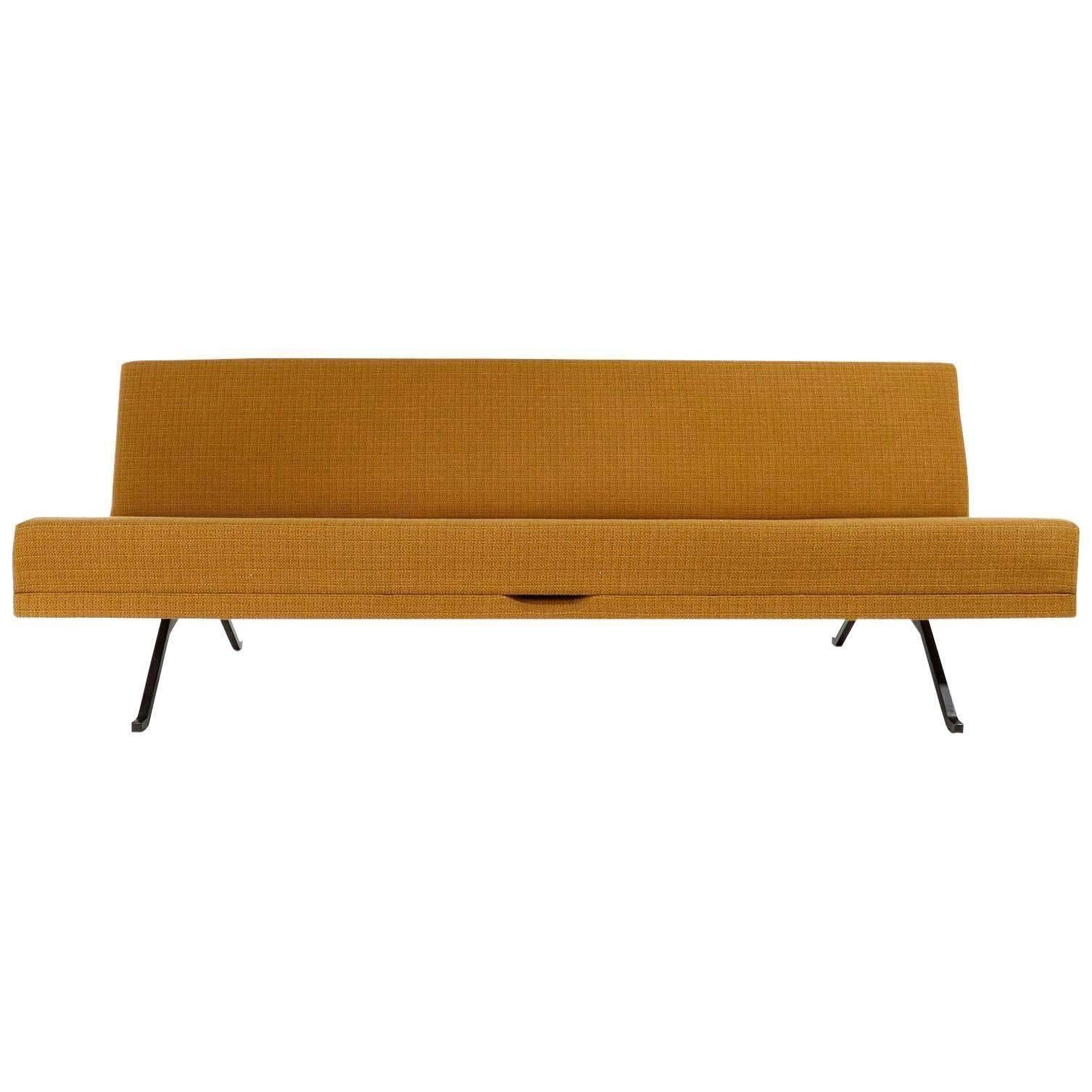 A freestanding sofa model 'Constanze' / 'Constance' with black steel and a fabric in a warm cognac / golden / ocher / mustard yellow / orange tone designed by Prof. Johannes Spalt for Wittmann, Austria, manufactured in midcentury, circa 1970.
By one
