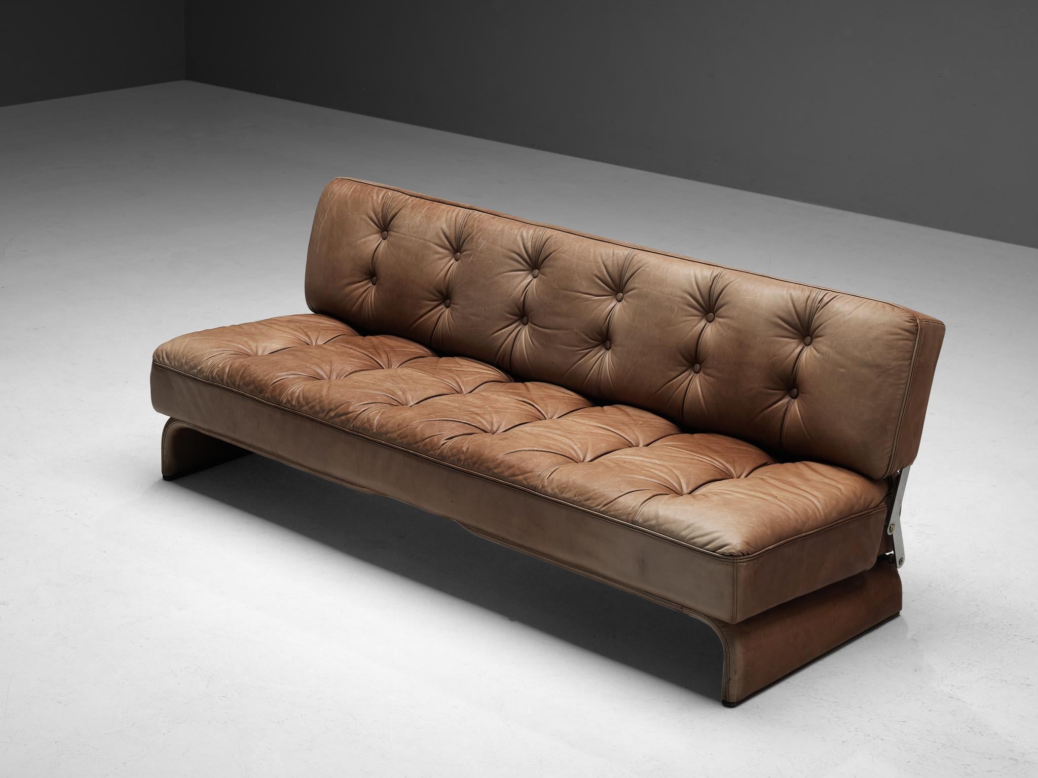 Johannes Spalt for Wittmann, 'Constanze' daybed or sofa, cognac leather, metal, wood, Austria, 1960s. 

This beautiful sofa designed by architect Johannes Spalt, is typical for Mid-Century Modern design from Austria of the 1960s. The tufted cognac