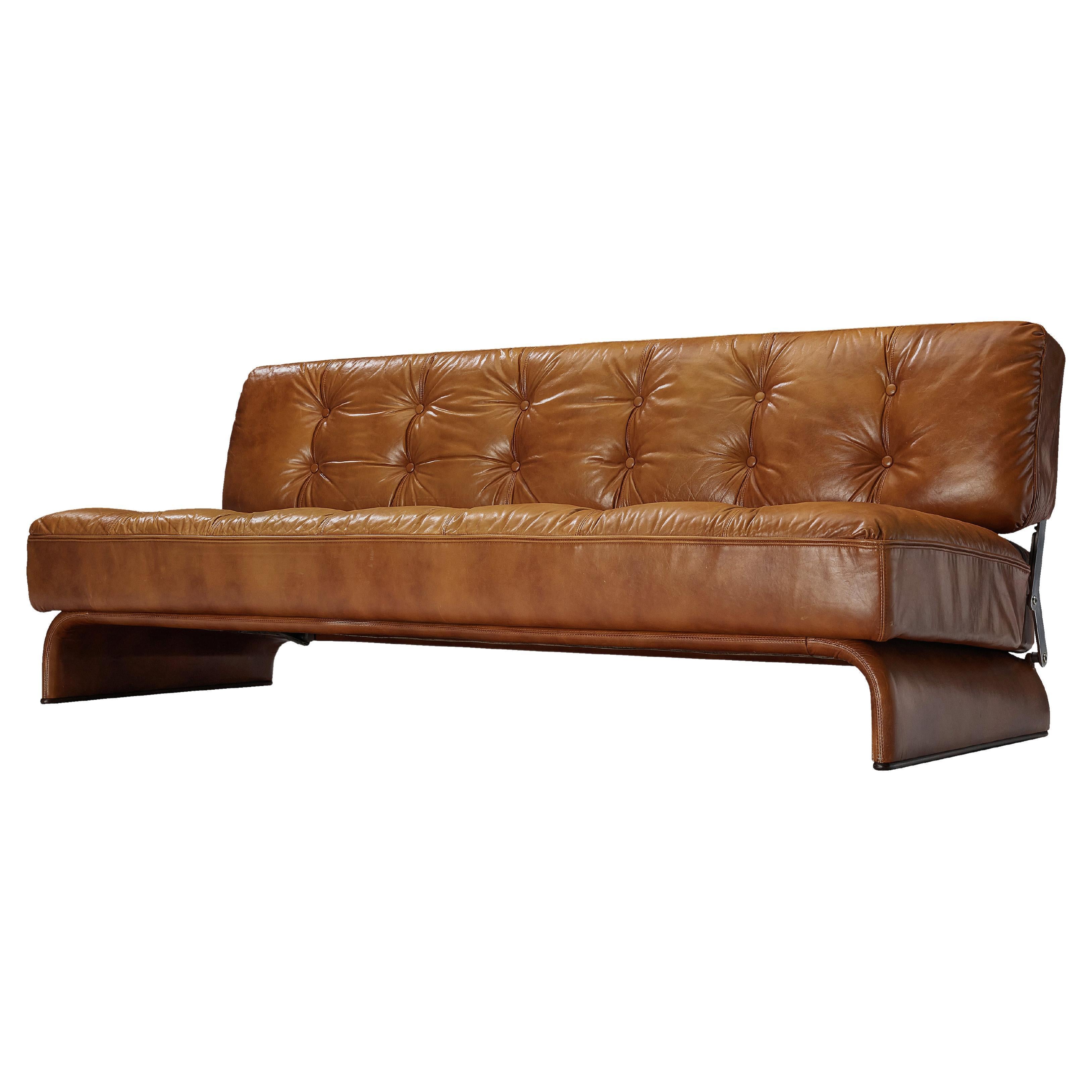 Johannes Spalt for Wittmann, 'Constanze' daybed or sofa, cognac leather, metal, Austria, 1960s. 

This sofa or daybed, designed by architect Johannes Spalt, is typical for mid-century modern design from Austria of the 1960s. The tufted cognac
