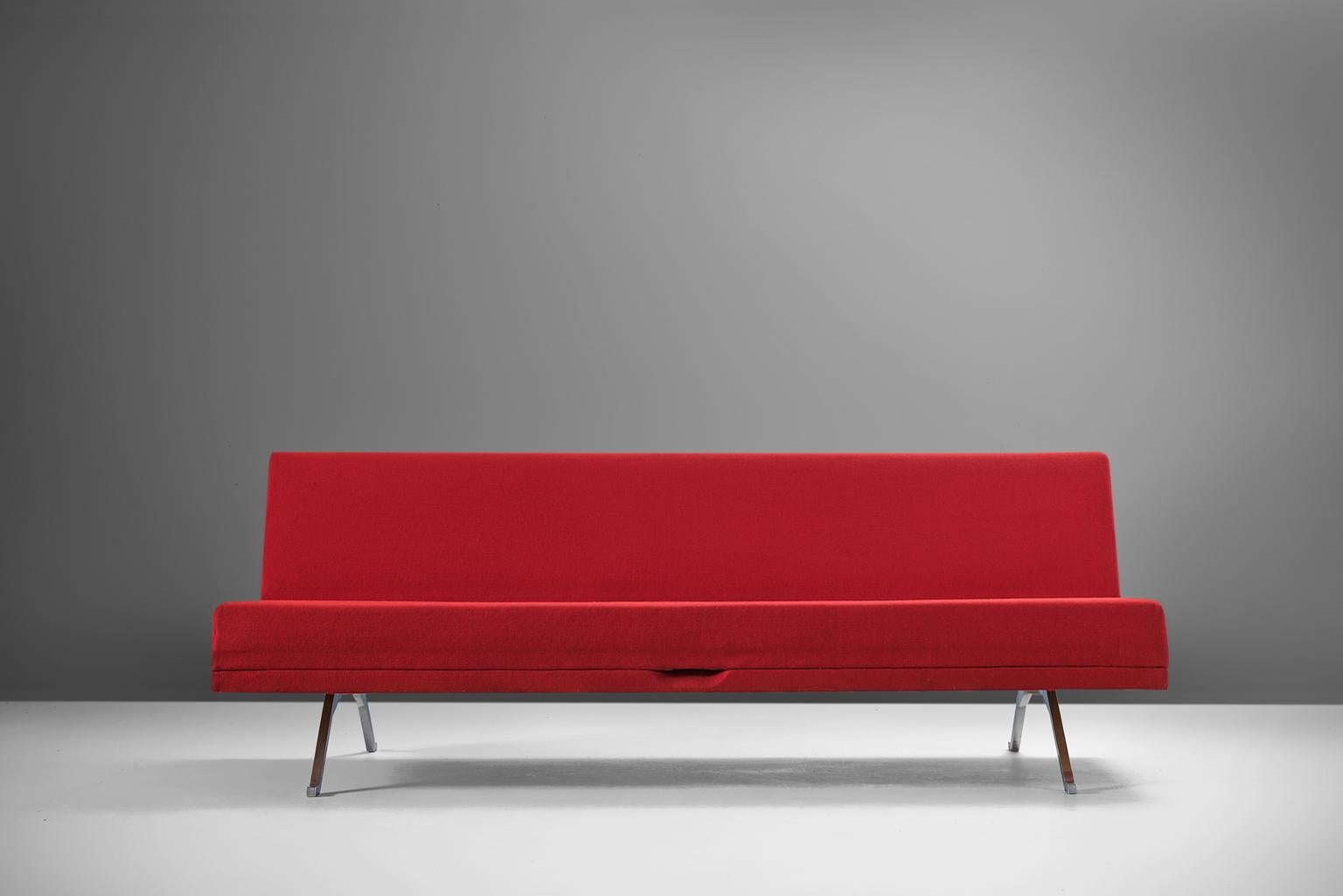 Johannes Spalt for Wittmann, sofa model 'Constanze,' chromed steel and fabric, Austria 1960s.

Sofa in red upholstery. The elegant slim legs create an open feeling and give the sofa the needed air to come across less solid and robust. By only one