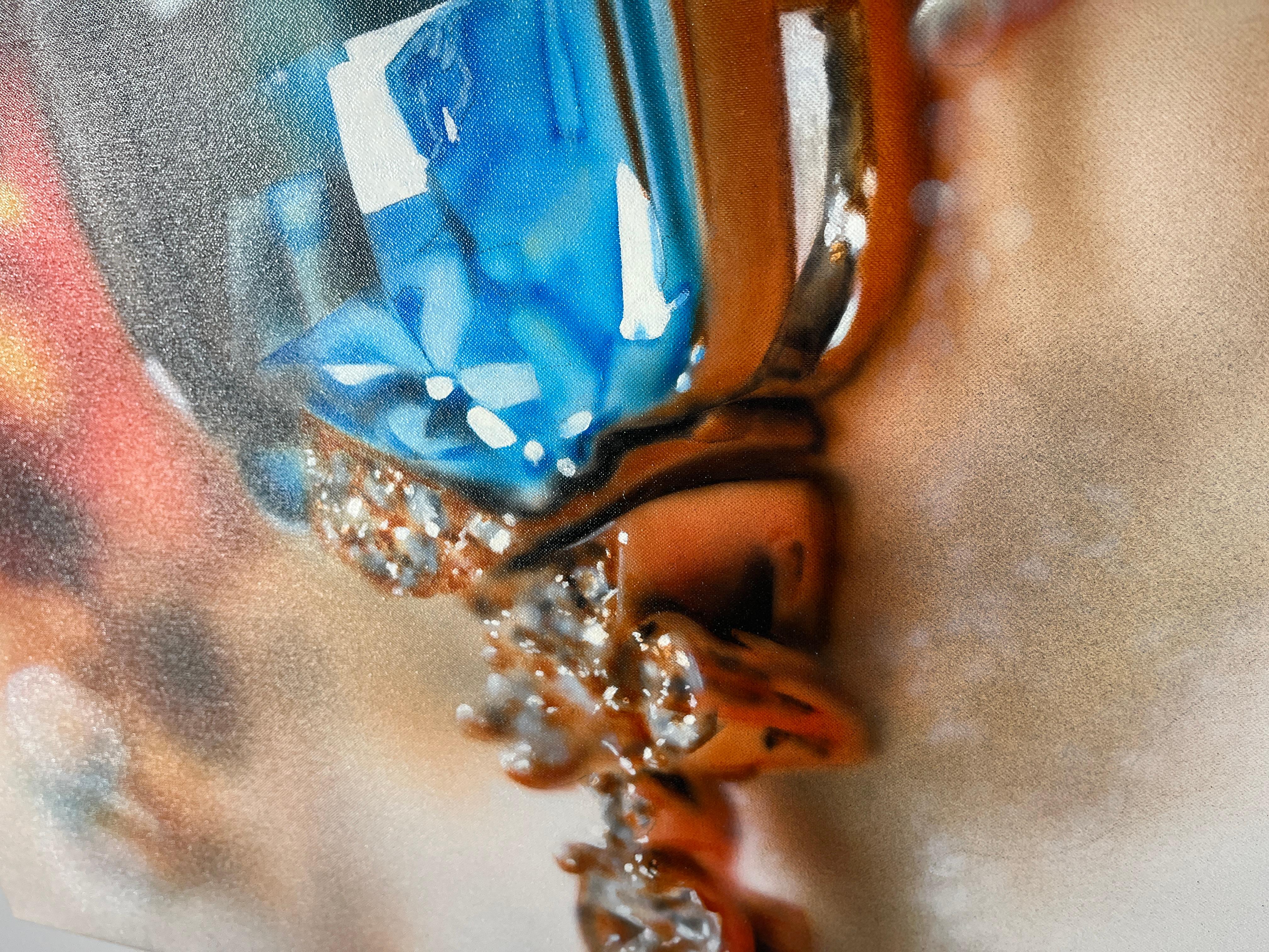 Acrylic & oil on canvas
21 x 38

In this painting, a Bulgari piece of jewelry takes center stage. The artist skillfully creates a composition where part of the jewelry is rendered in hyper-realistic detail, while the rest fades into the background,
