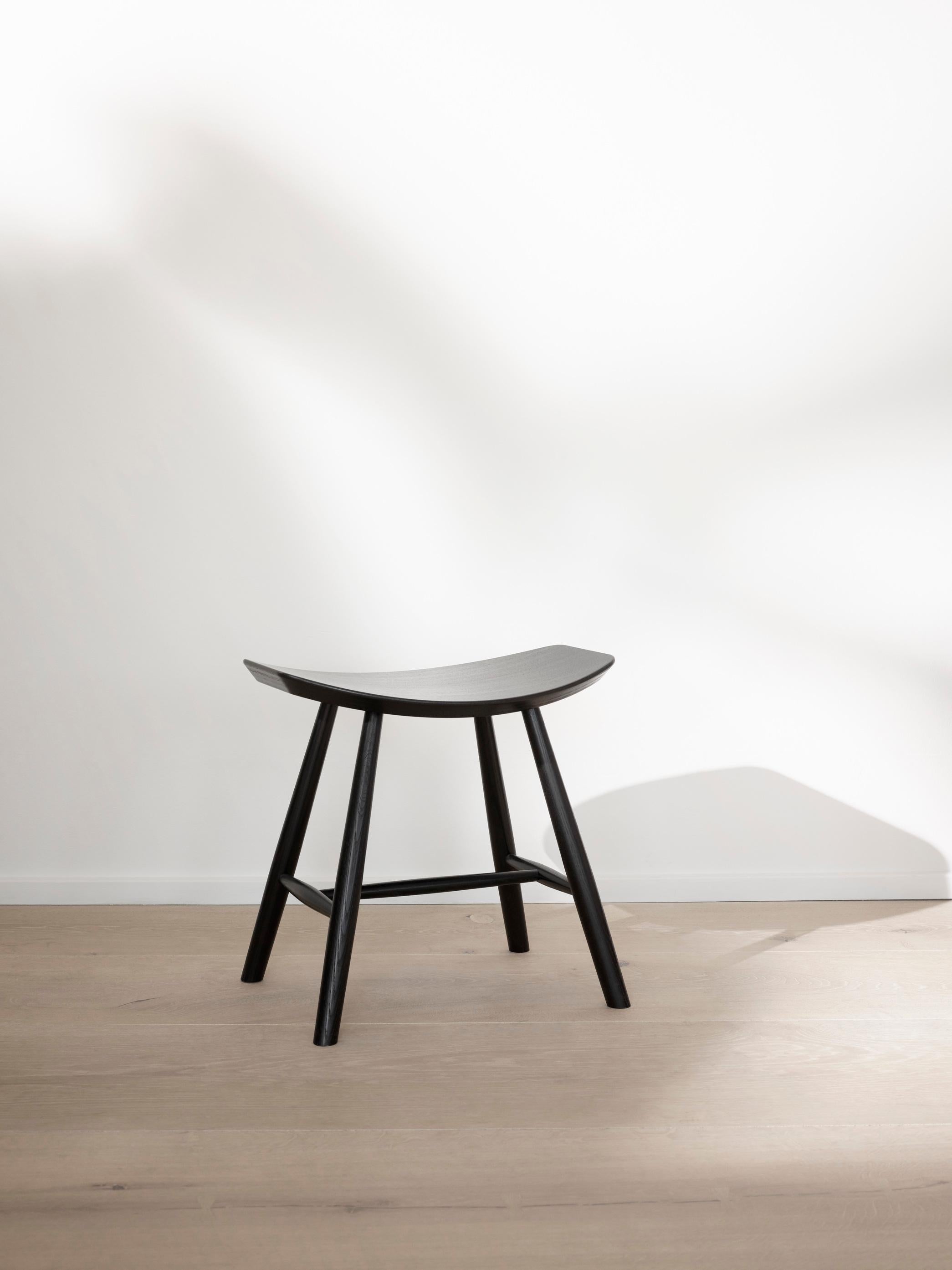 The J63 Stool echoes a similar bare simplicity, with a focus on the functional and the practical. Clearly evident the J63’s curved seat and simple, supportive frame.

It’s the kind of design you would welcome as an occasional seat for guests, a