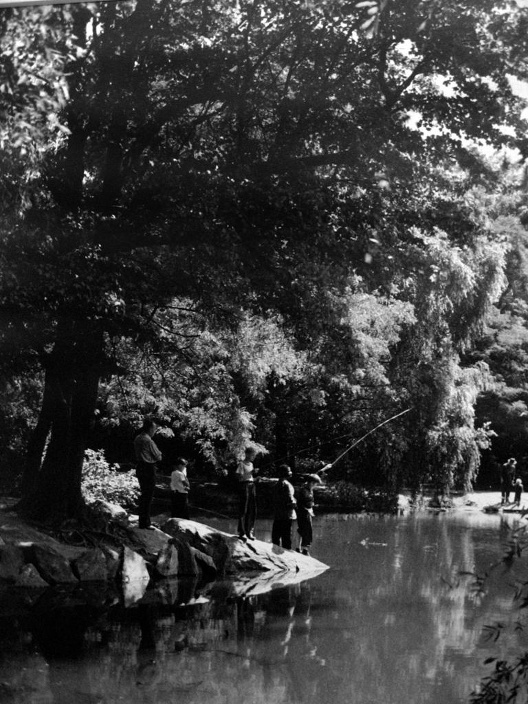 John Albok Figurative Photograph - Central Park, NY (boys fishing)