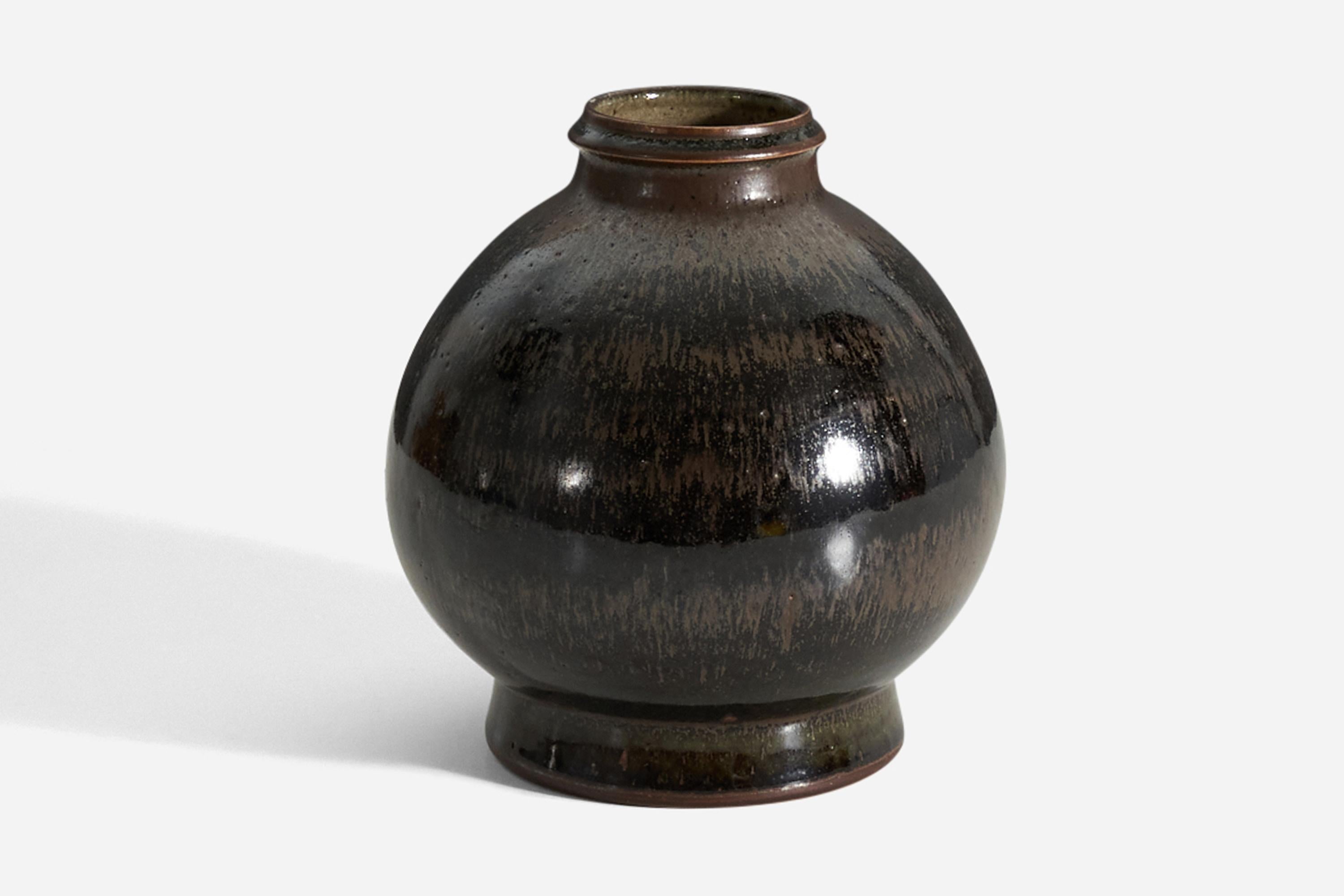 A vase, designed by John Andersson, for Höganäs Keramik, Sweden, 1960s. In black and brown glazed stoneware.

Overall Dimensions (inches): 8.0