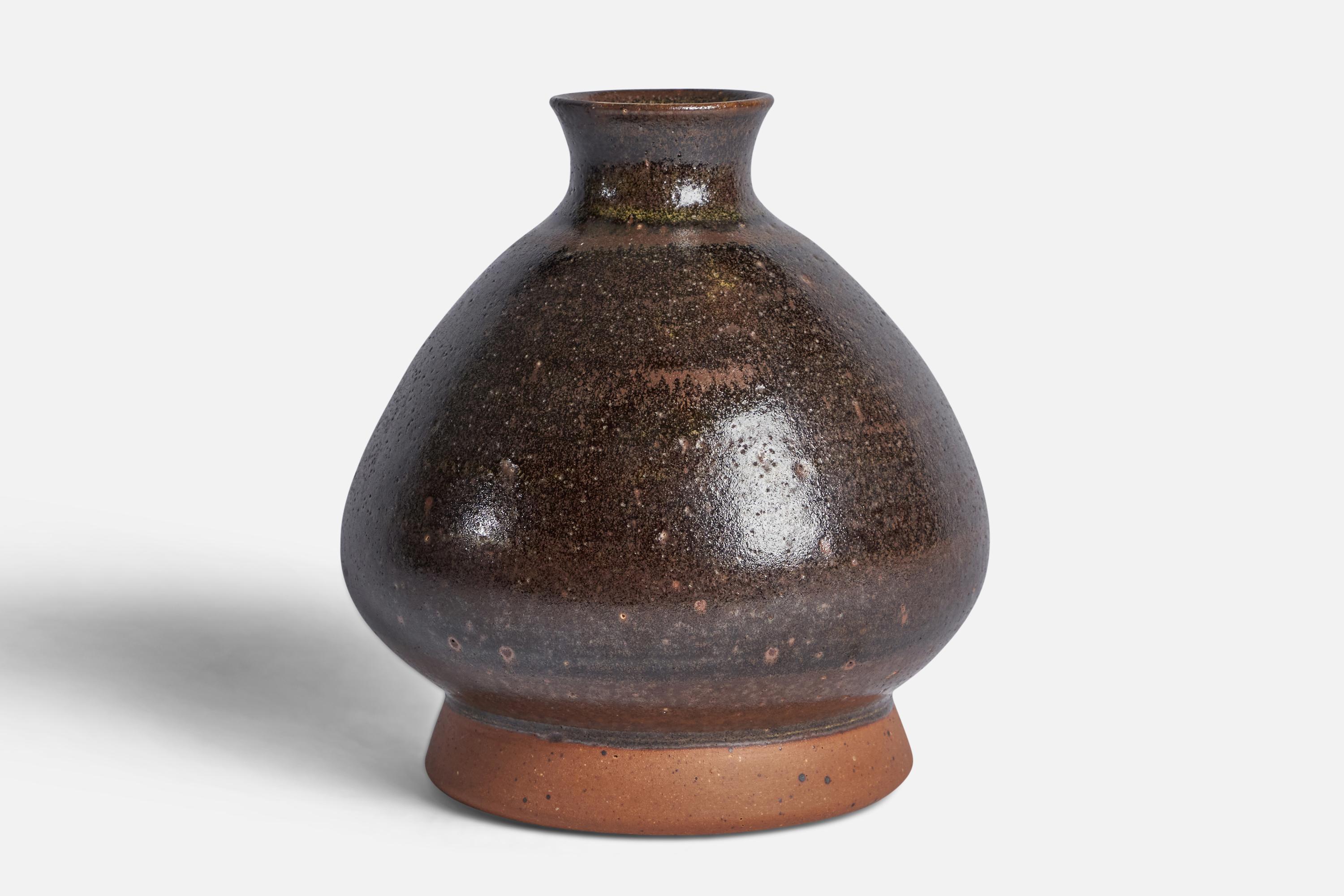 A brown semi-glazed stoneware vase designed and produced by John Andersson, Höganäs, Sweden, c. 1950s.