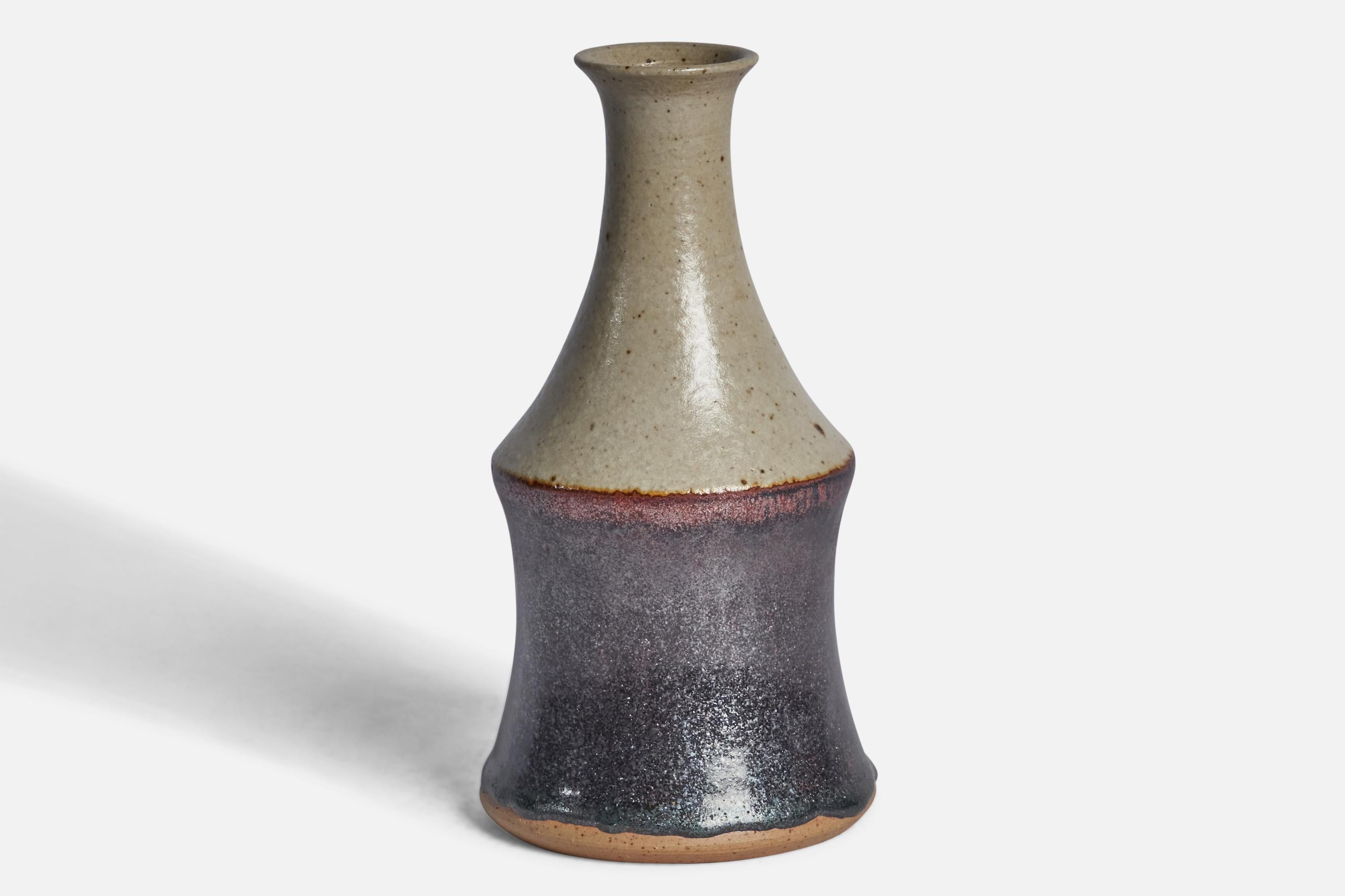 A black and grey-glazed stoneware vase designed and produced by John Andersson and produced by Höganäs, Sweden, 1960s.