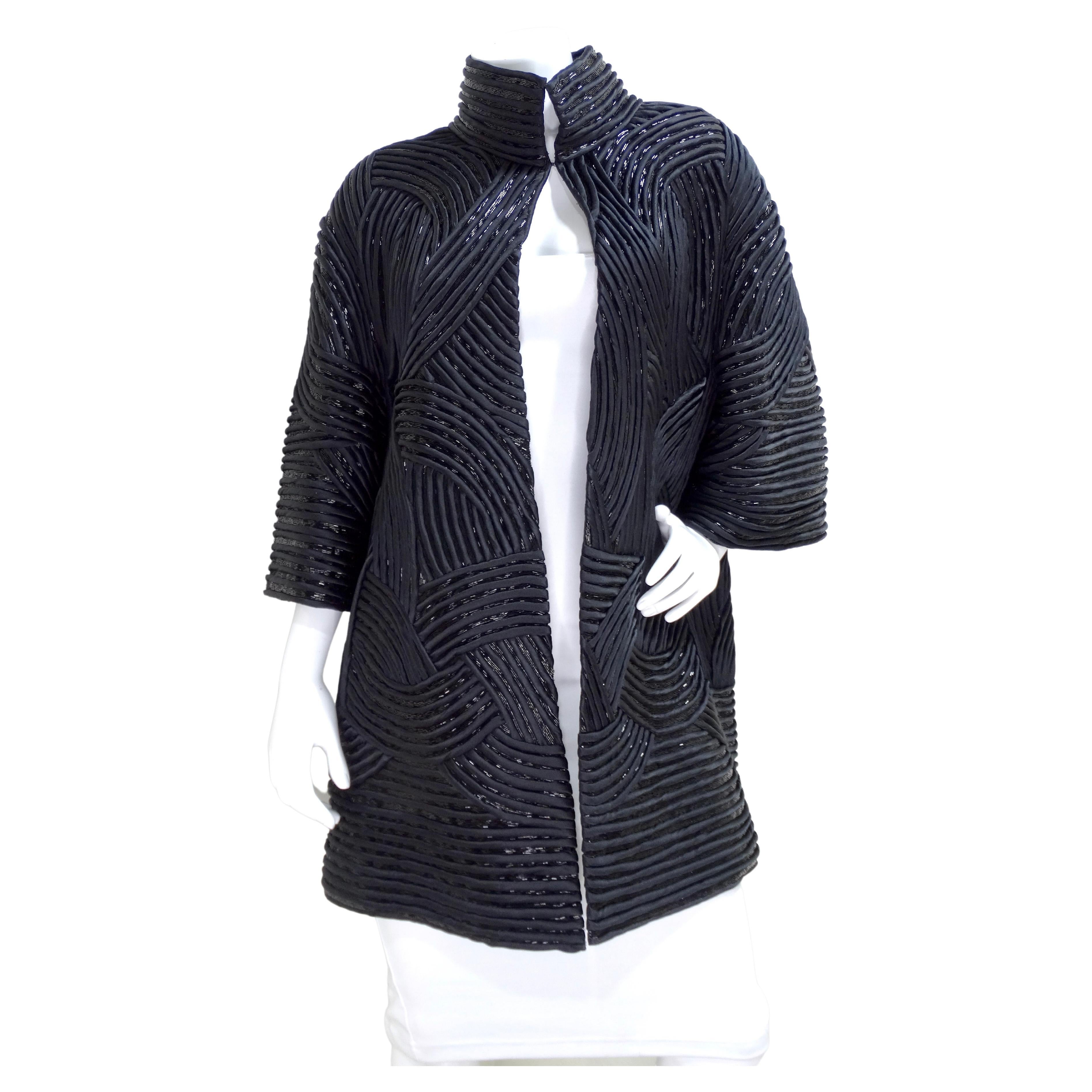 Snag this beautiful piece of John Anthony today! This is a very rare one of a kind and unique find that you need in your wardrobe! Zoom in on this jacket to not miss the intricate details. This is a highly textured black satin material is covered in